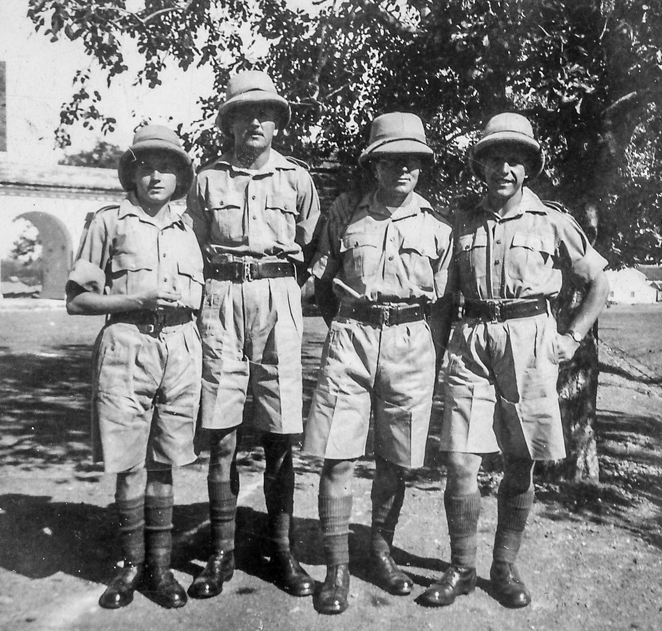 "Taken behind billet 10th Feb 1942. All draughtsmen. T Burke, J Edwards (the Welsh lad I mention in my letters), A Whitham"