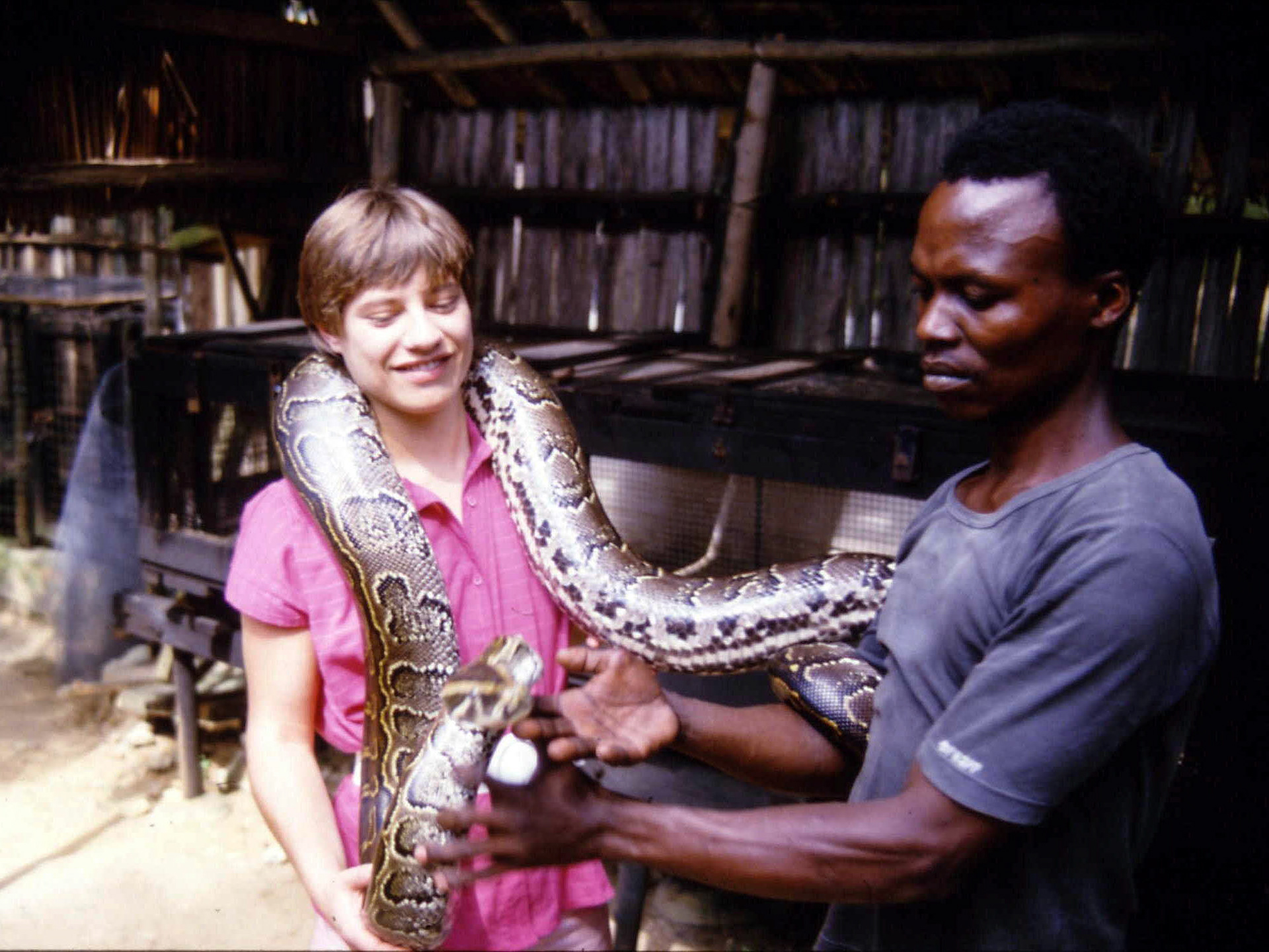 Lesley with snake, Malindi, Kenya, 1982