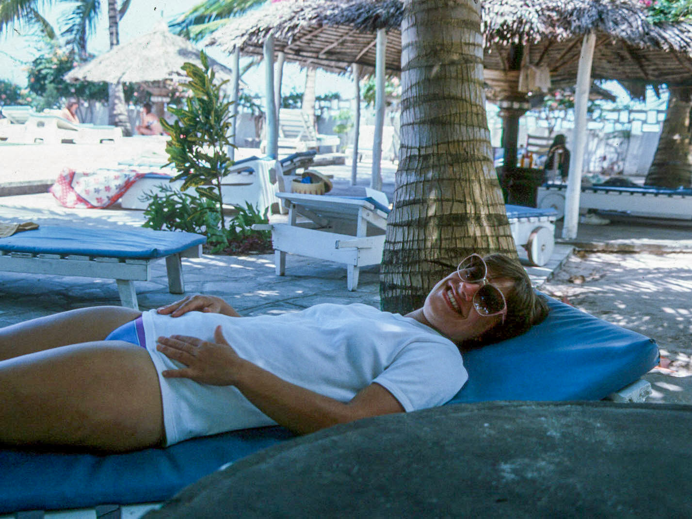 Lesley on beach lounger, Mombassa, Kenya, 1982