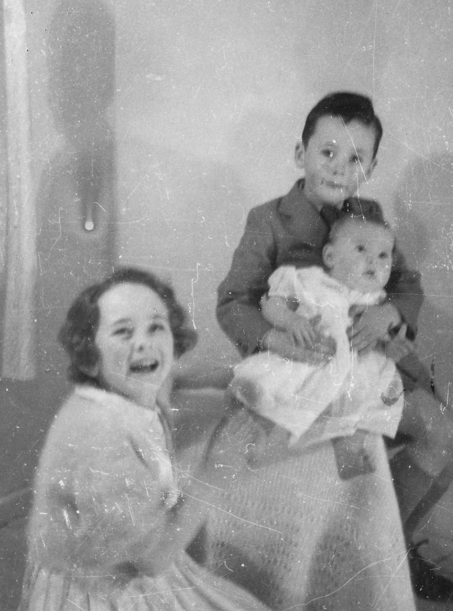 "Howard 10 months, Stuart 7 years, Laurene 9 years" So that'll be June 1955