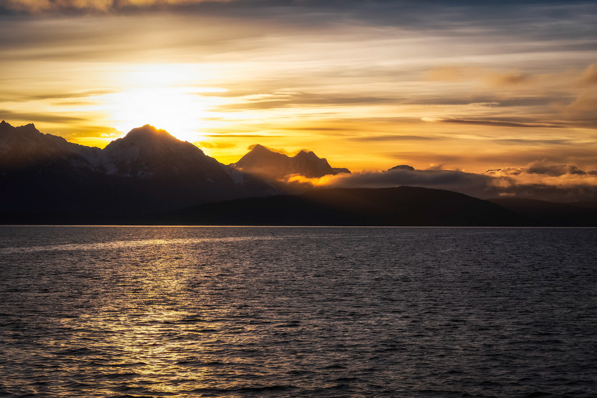 Low sun in November in the Fjords outside of Tromso