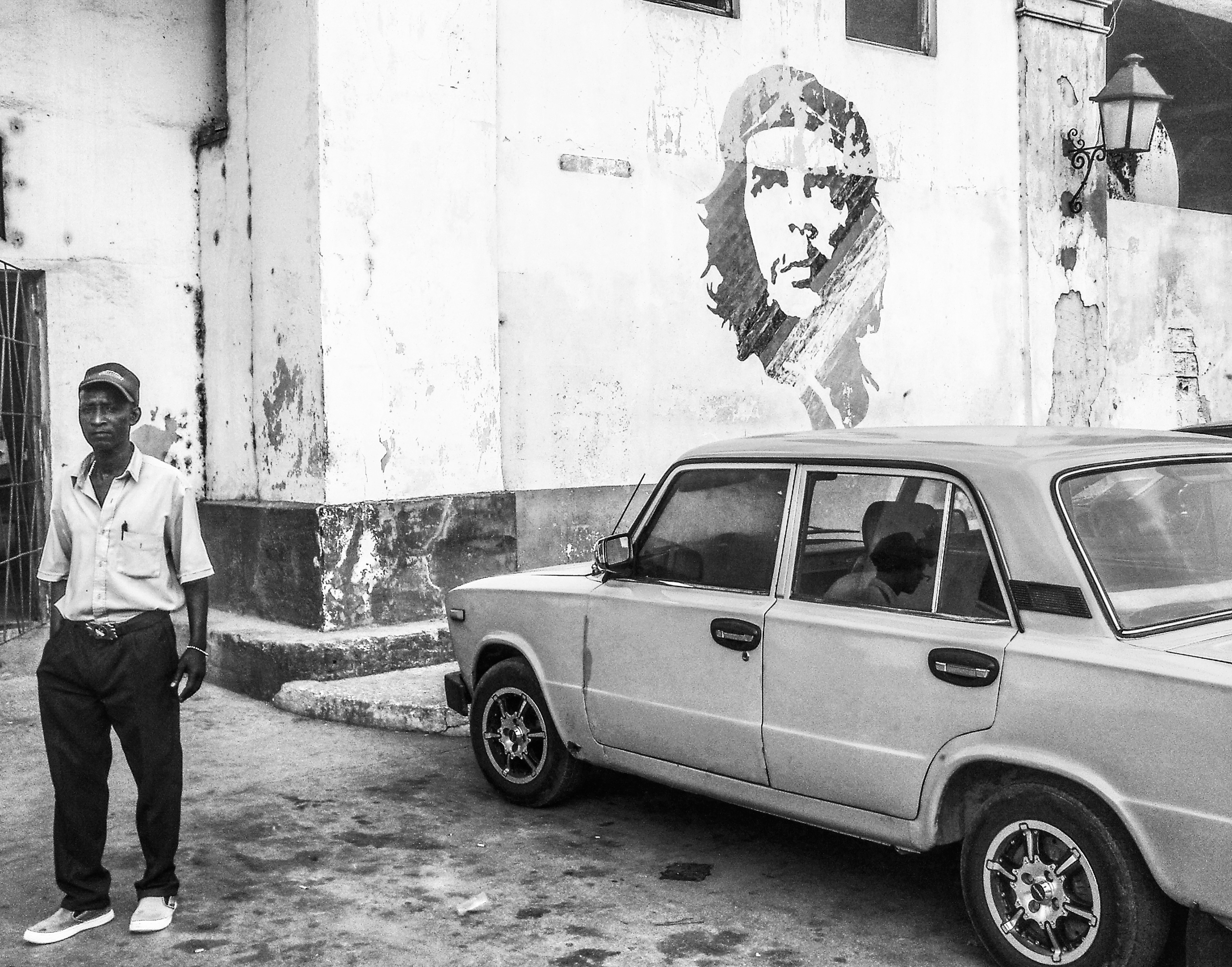 One of the most iconic images from Cuba along with one of its most iconic cars. The gentleman is a mechanic.