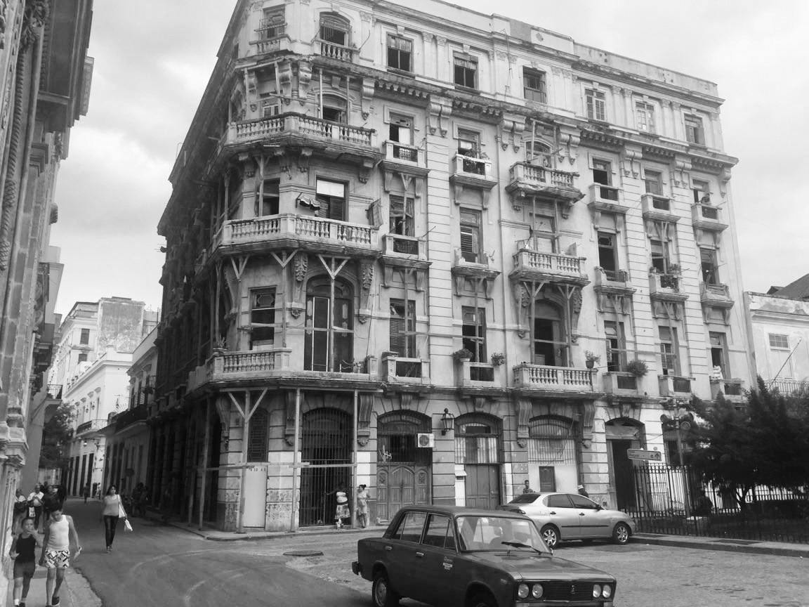 Just a block away from the new square, this apartment block is just standing up.