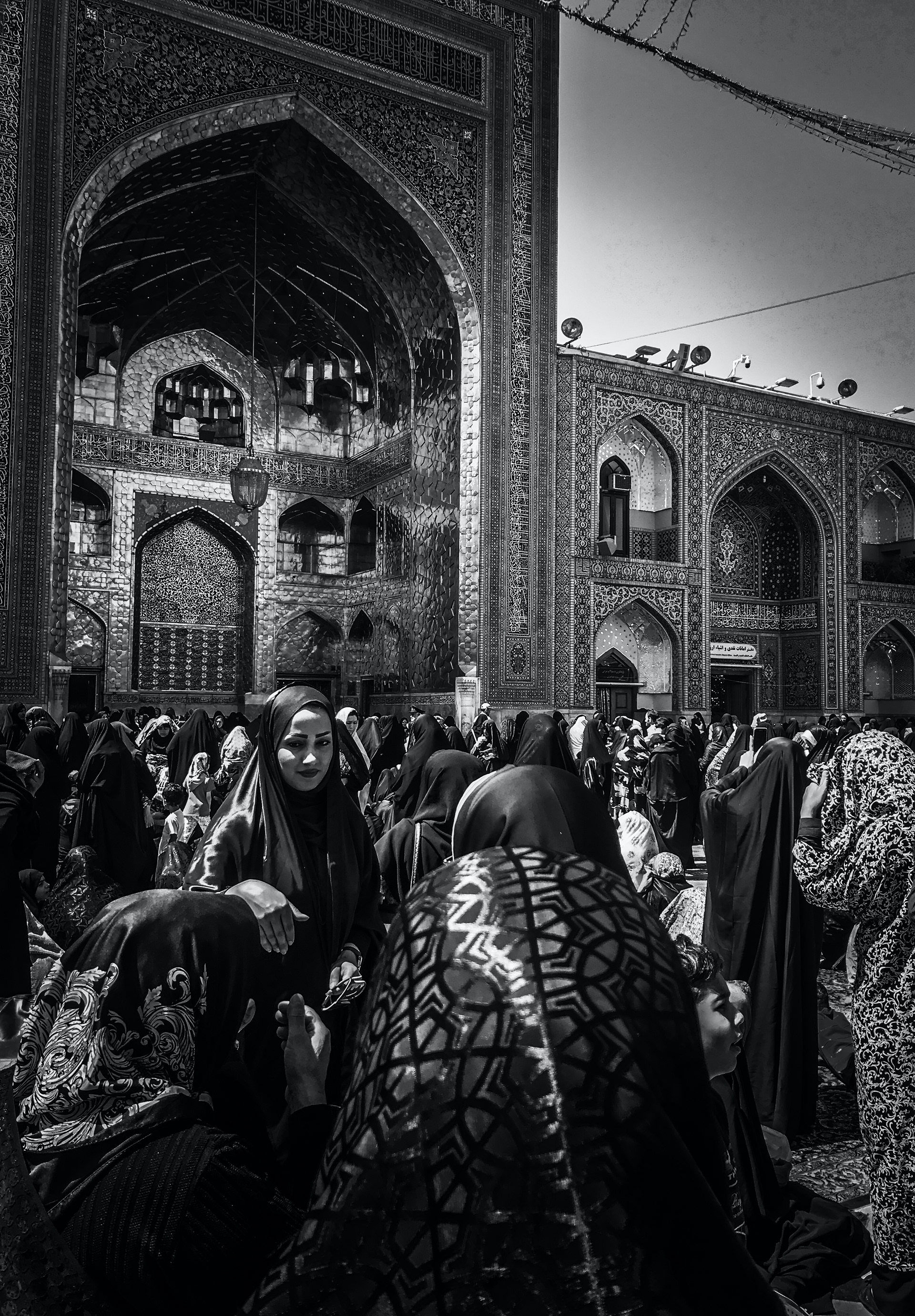Crowds of ladies outside the tomb of Raza