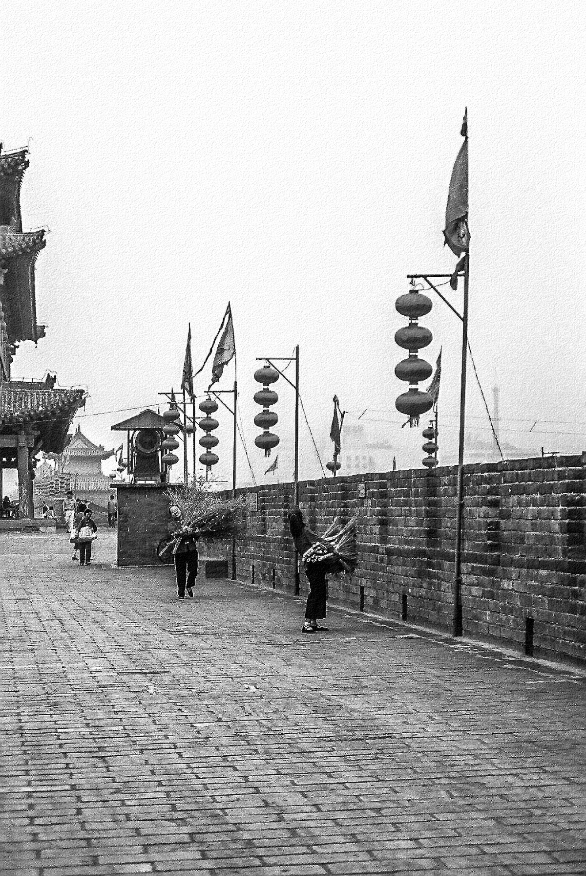 Workers atop the city wall