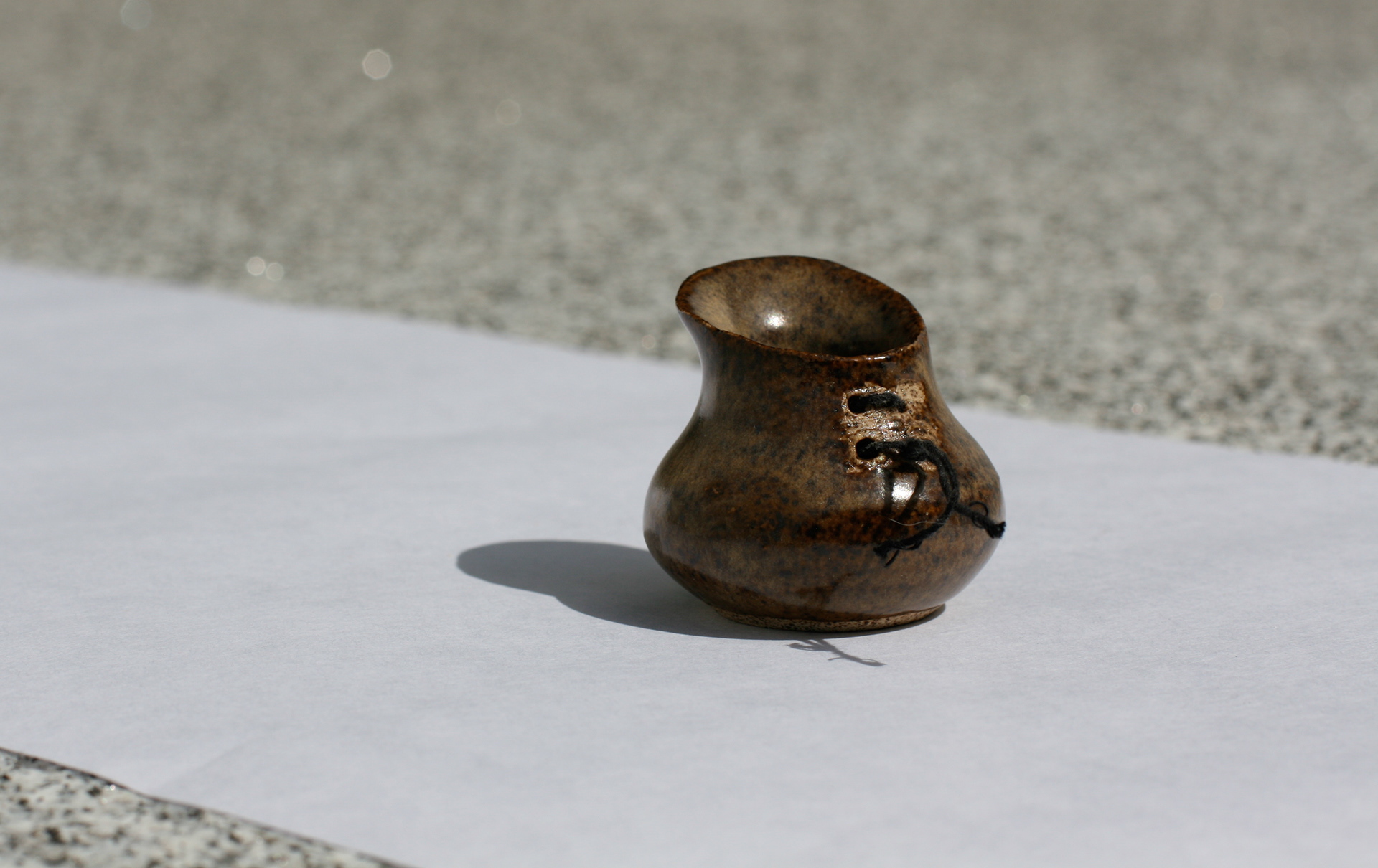 petite pitcher ~1.5"h x 1.5" dia.