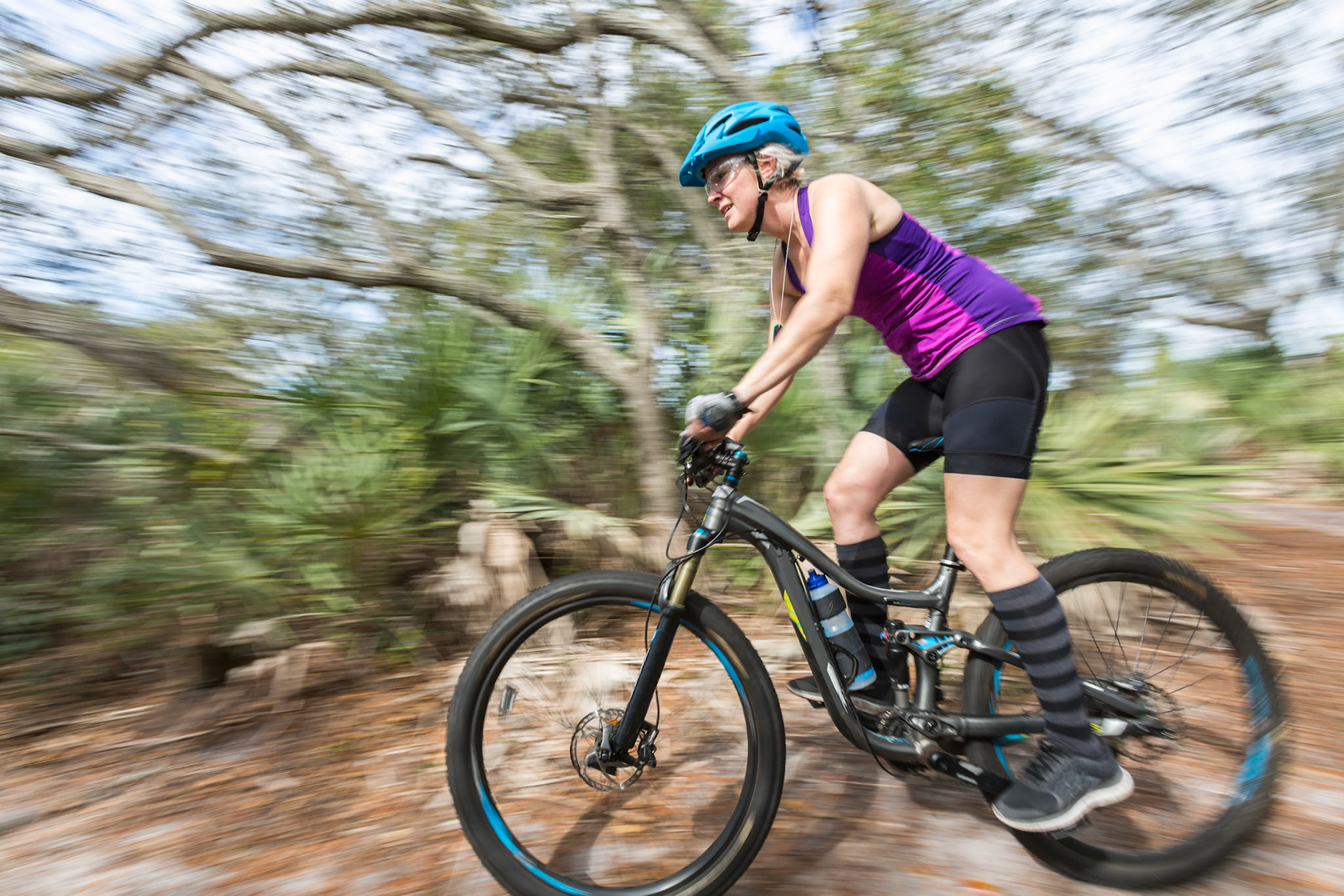 Female mountain biker riding the trails