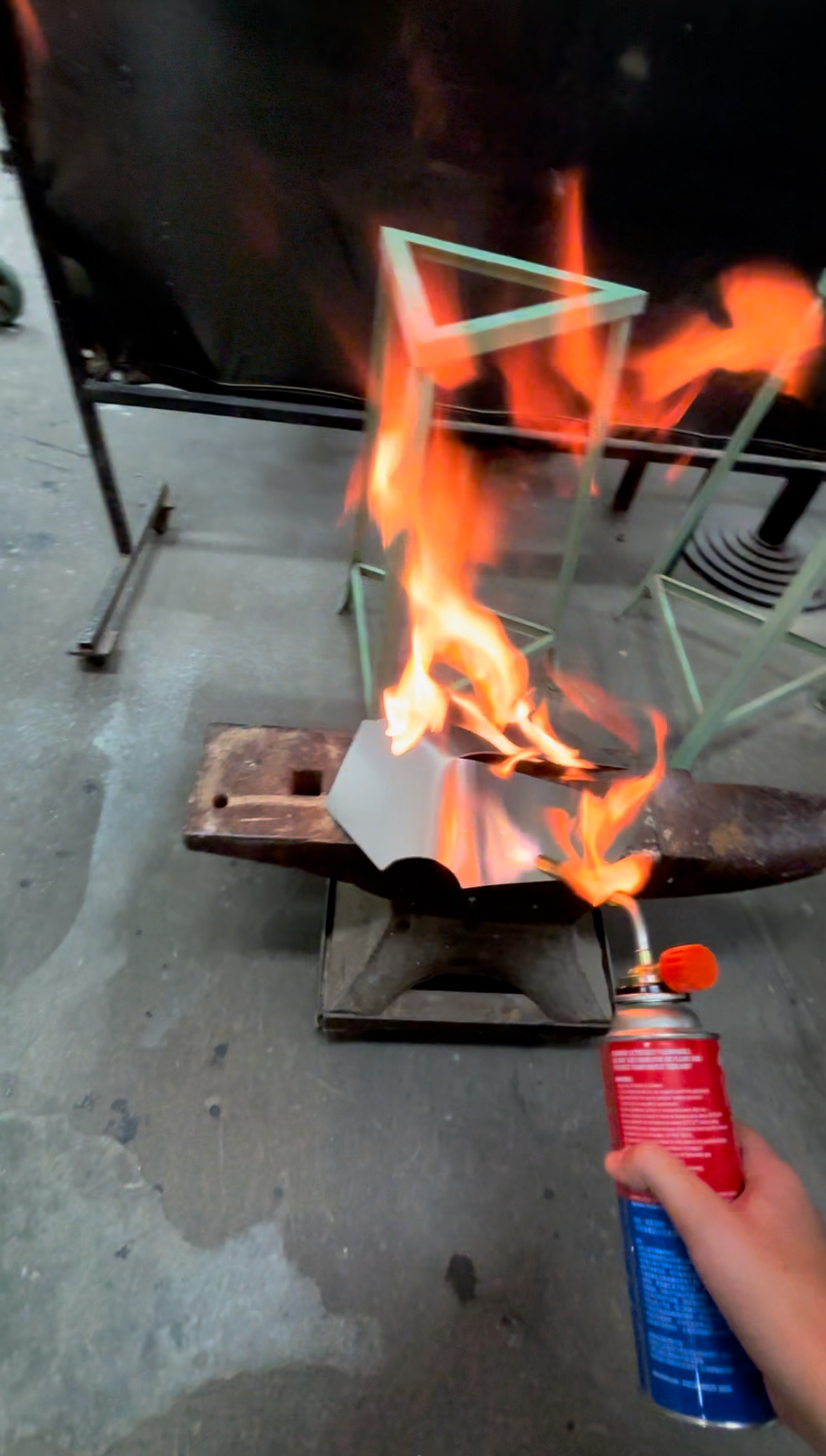 Using fire to heat up the metal to bend
