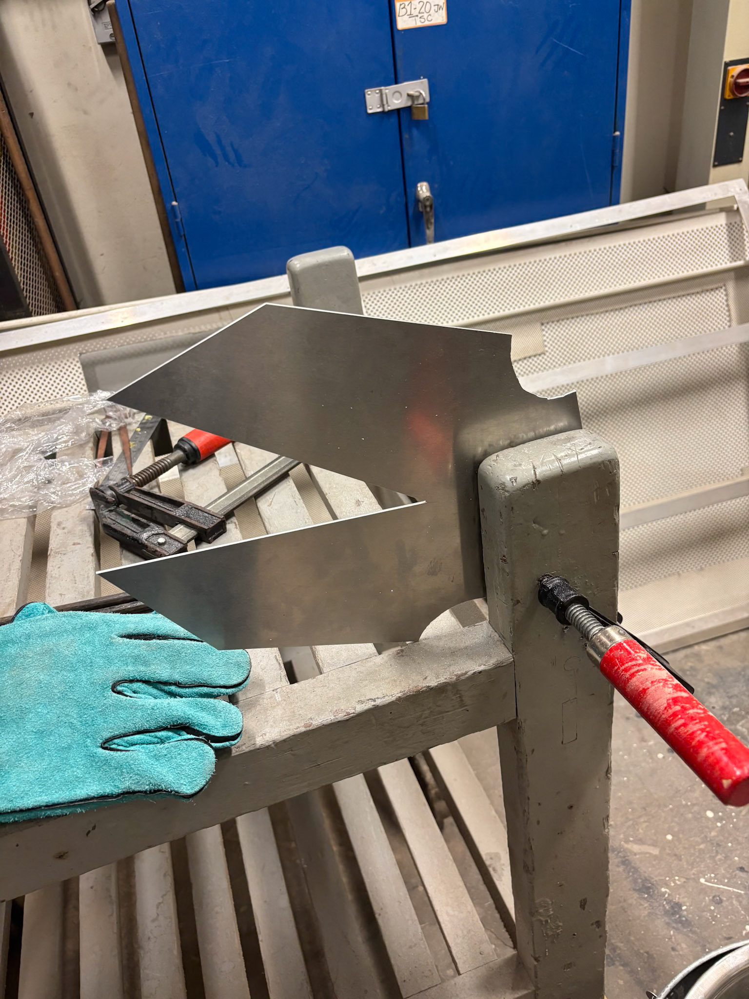 Cutting out the shape from the metal plate