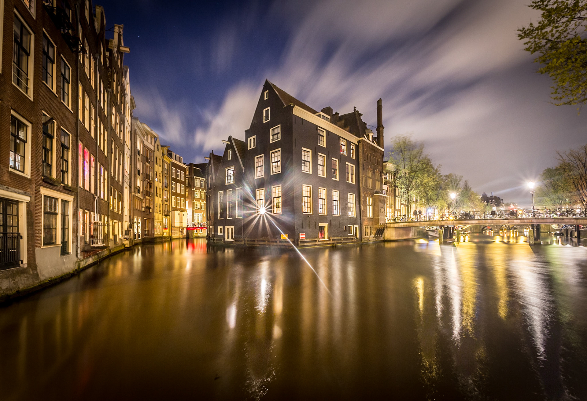 Amsterdam, houses reflecting on canal, Netherlands, Europe.