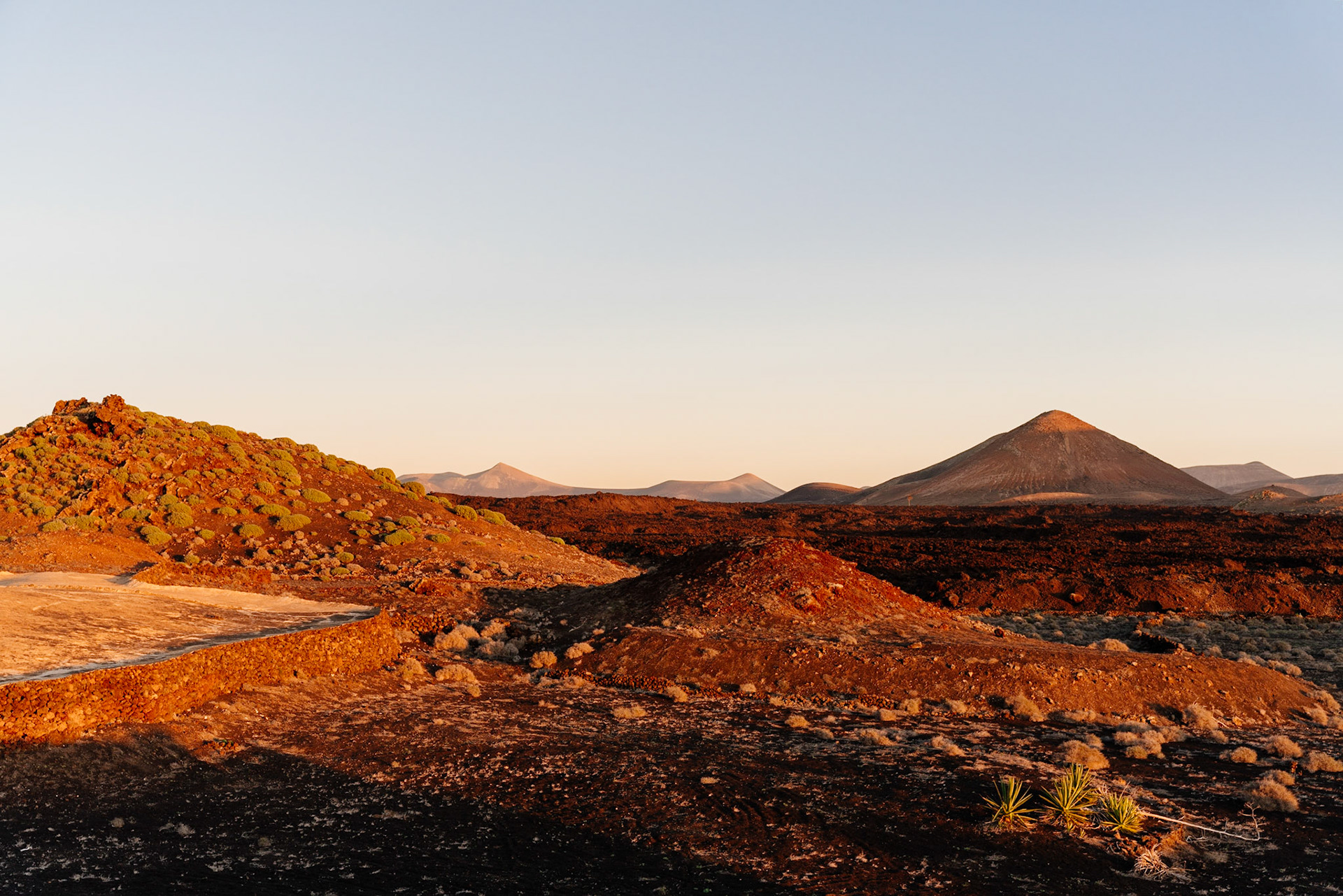 Volcanic landscape at sunset, Timanfaya, Lanzarote, Canary Islands. Spain