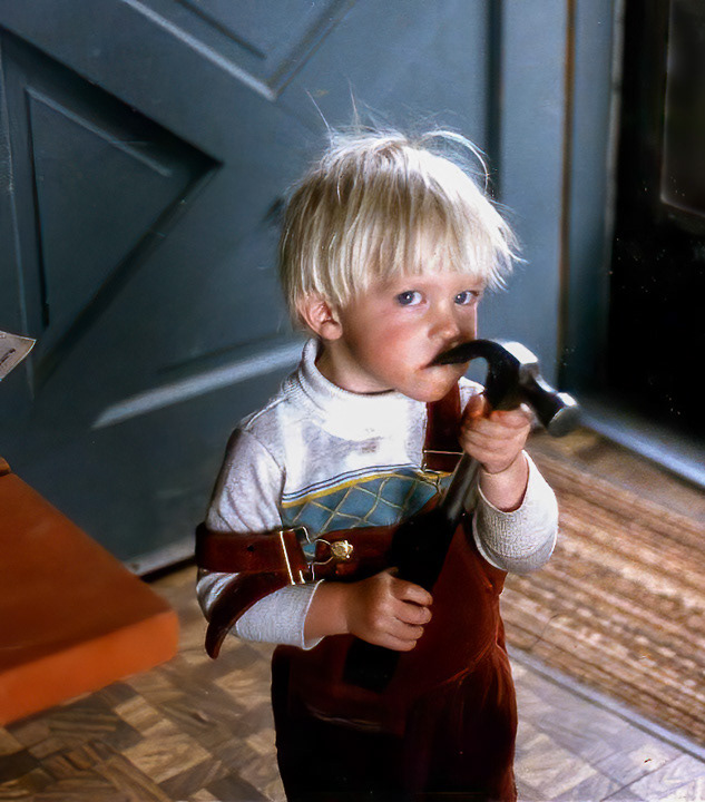 Nate sucking on a hammer