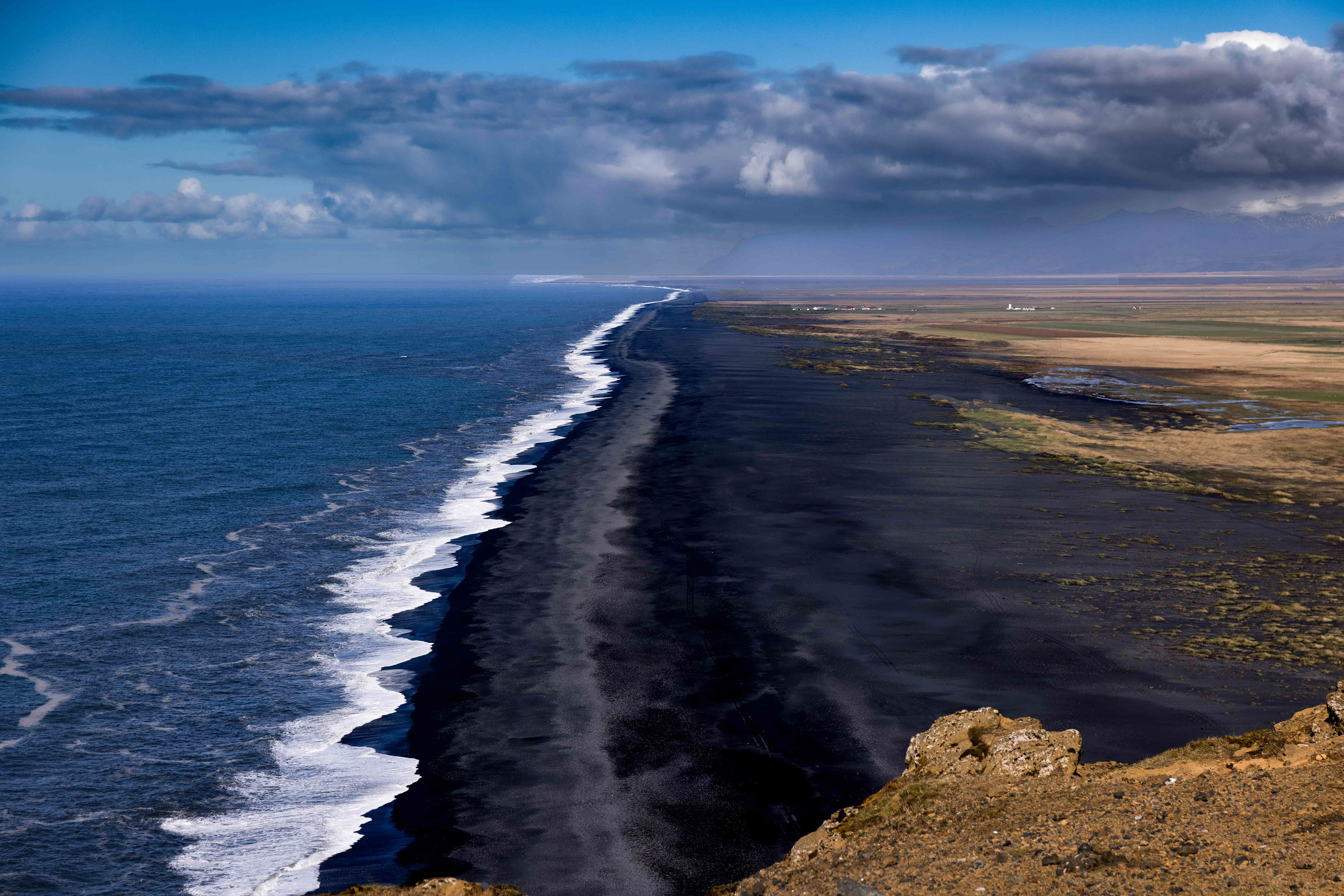"endless" black beach of basalt