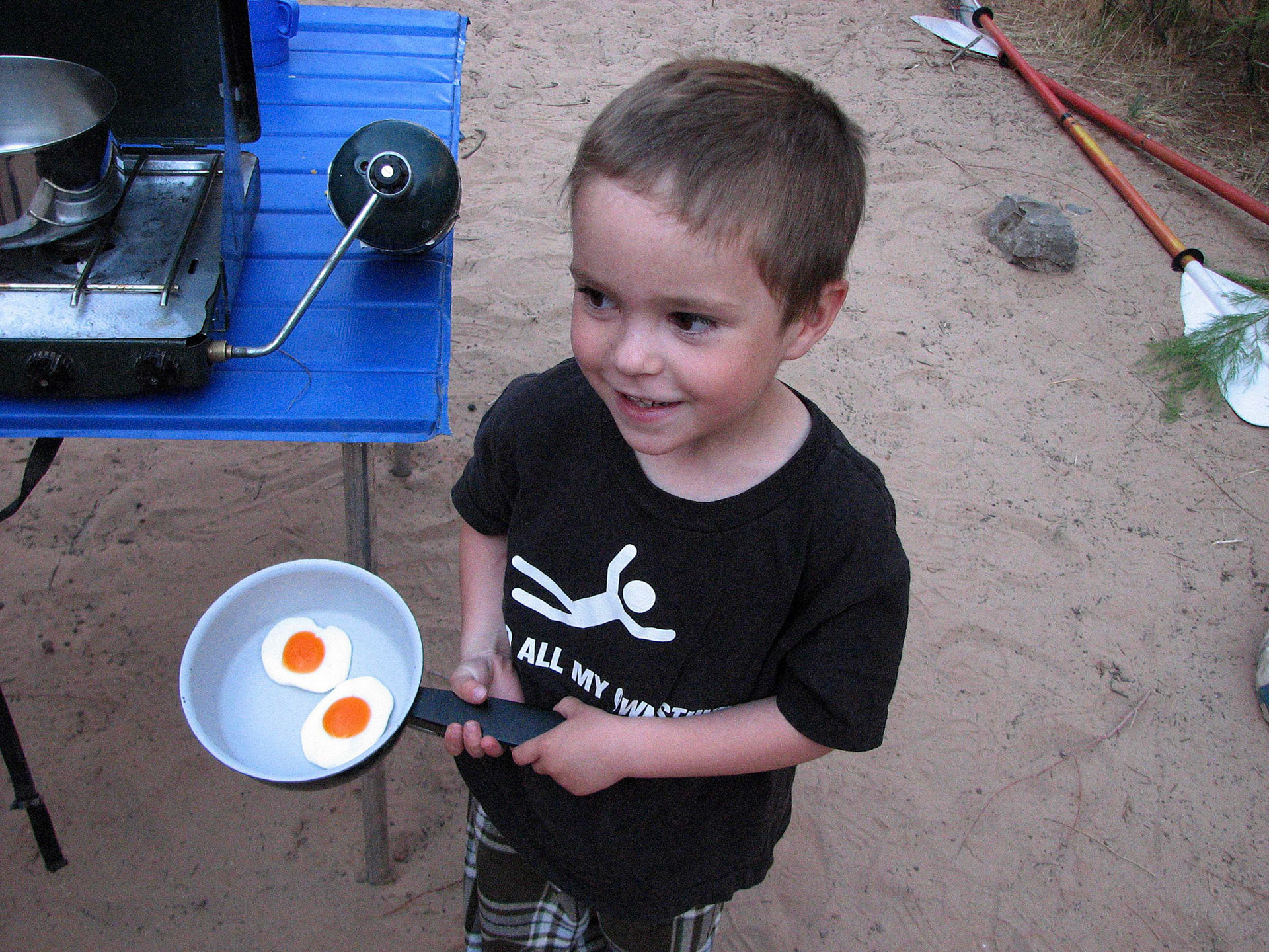 Asher prepared a plastic egg breakfast for Bic.