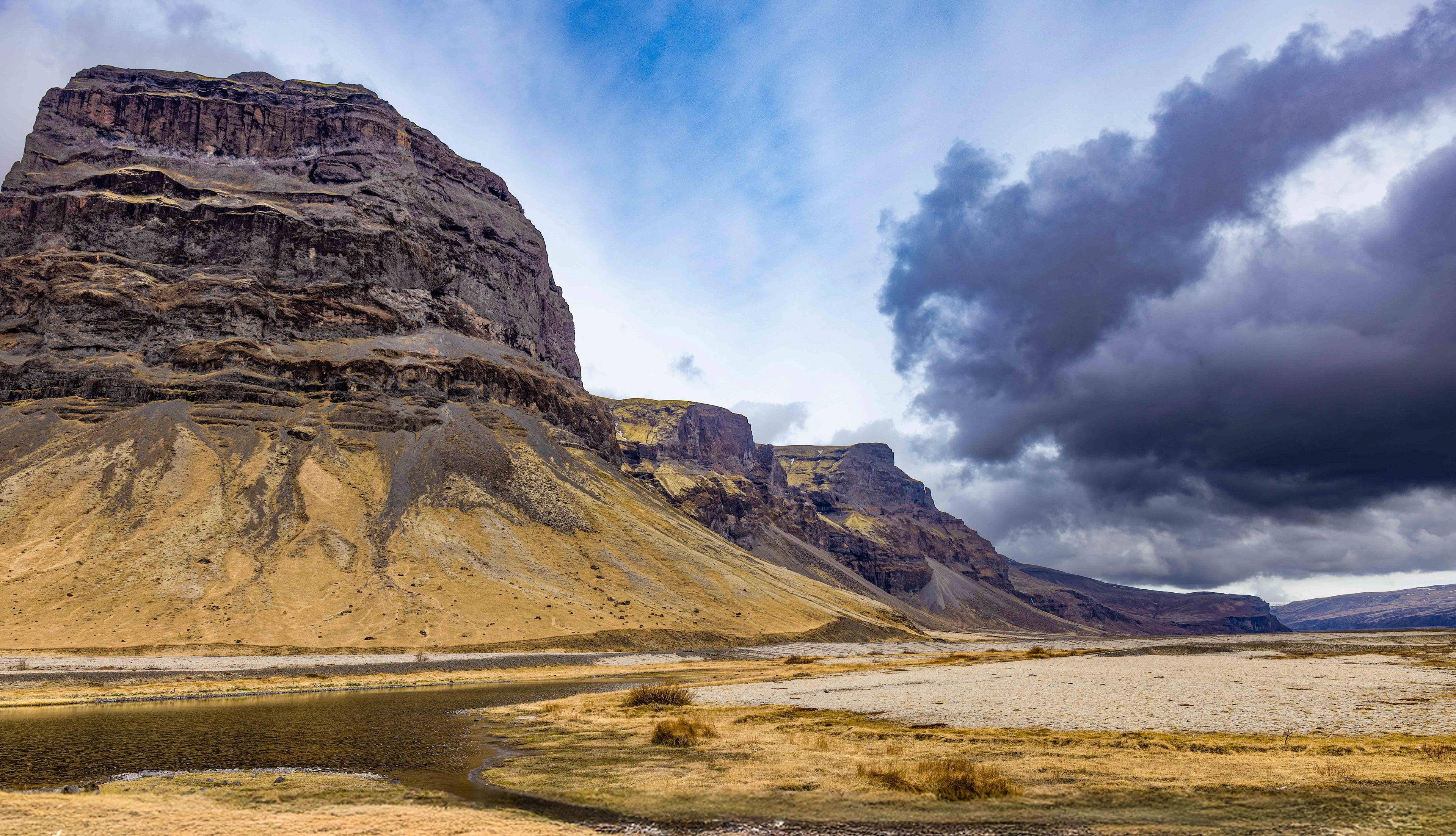 Lómagnúpur mountain formed from volcanic activity beneath a large ice sheet.