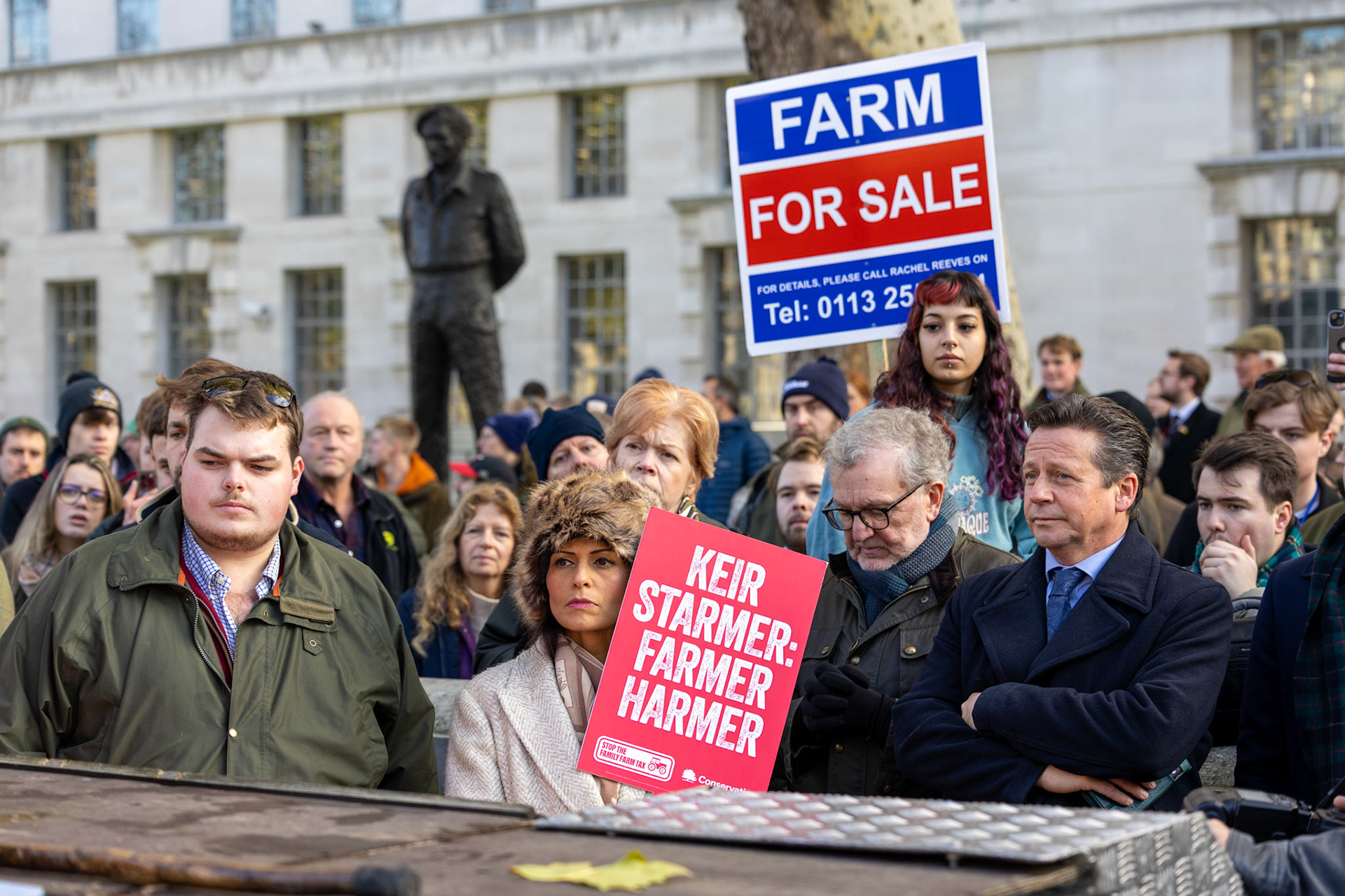 Front Left to right, Cameron Kinch, Priti Patel MP, Nigel Huddleston MP