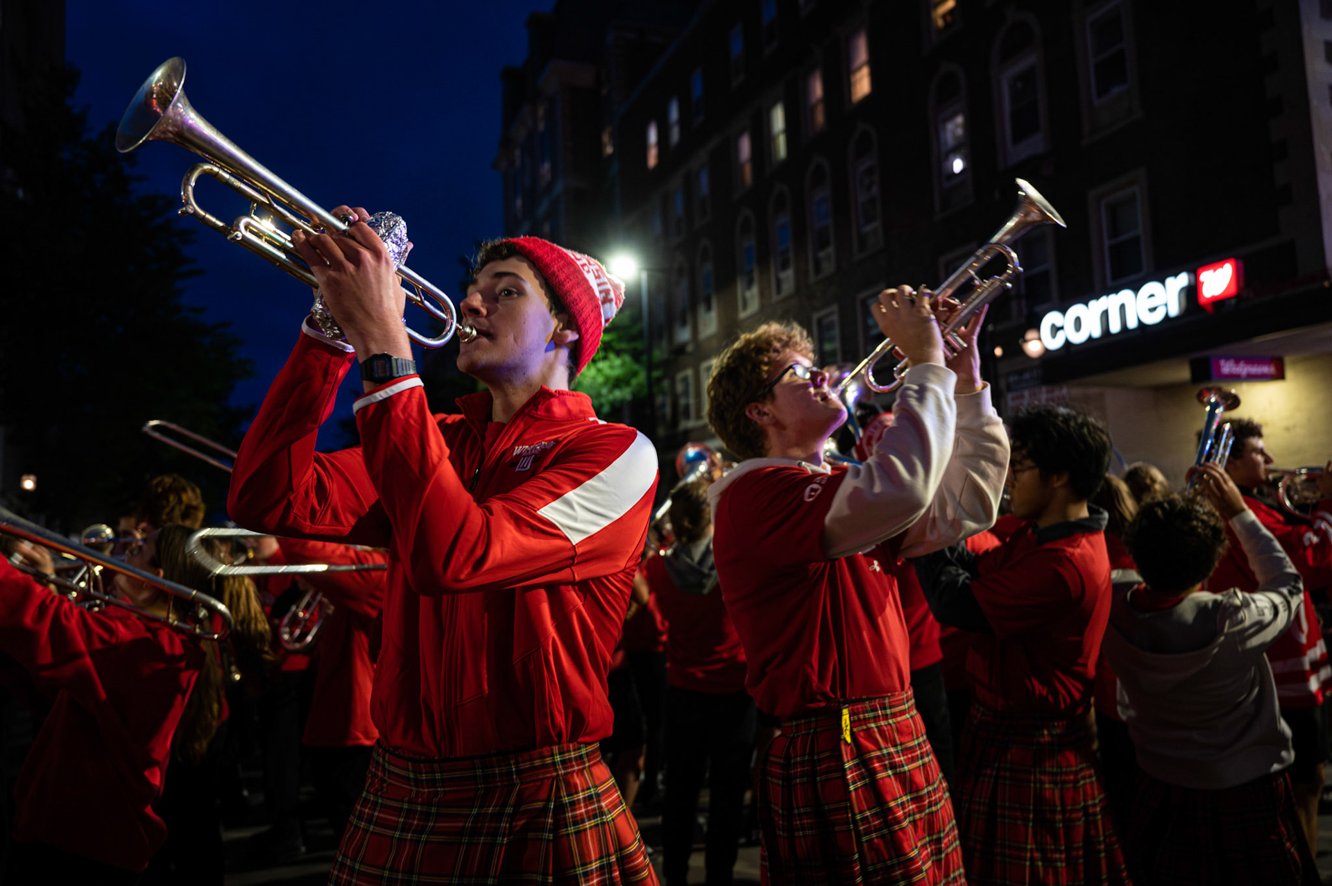 Members of the UW Marching Band play for the crowd during UW Homecoming Parade along State Street at the University of Wisconsin-Madison on Oct. 6, 2023. (Photo by MK Denton / UW–Madison)