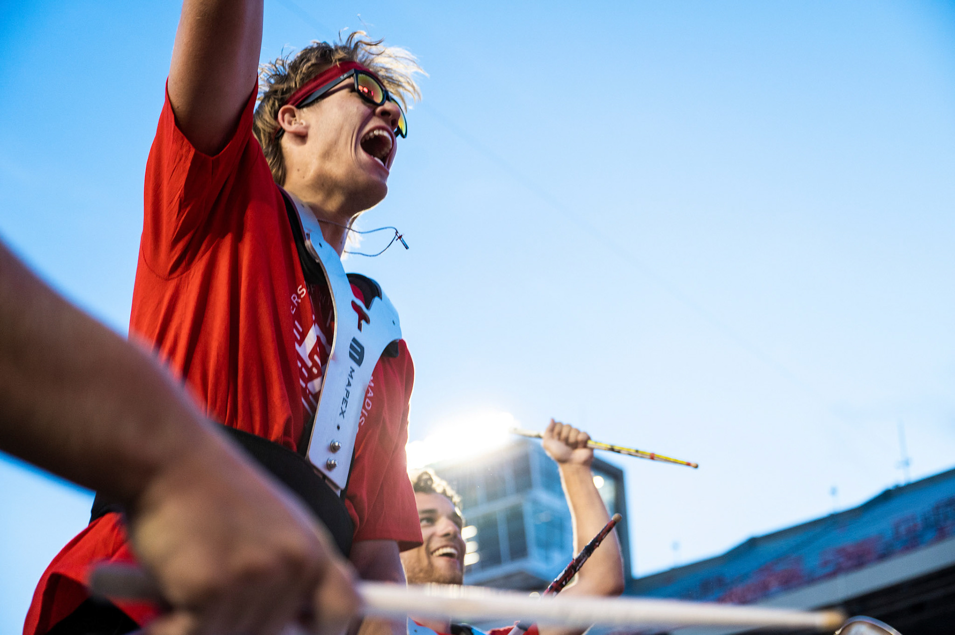 A band member cheers on first-year students as part of the W Project on Barry Alvarez Field at Camp Randall Stadium at the University of Wisconsin-Madison on Sept. 1, 2023. (Photo by MK Denton / UW–Madison)