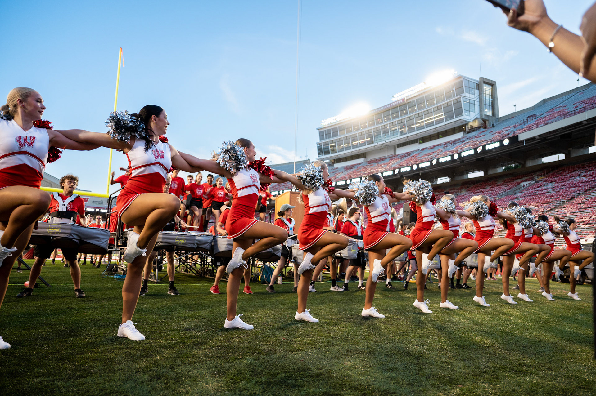 Members of the UW-Madison spirit squad dances during the W Project on Barry Alvarez Field at Camp Randall Stadium at the University of Wisconsin-Madison on Sept. 1, 2023. (Photo by MK Denton / UW–Madison)
