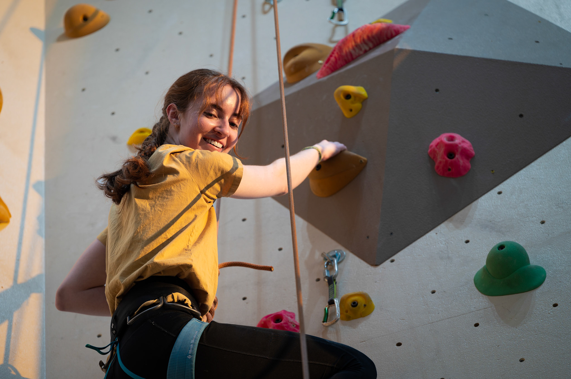 Jillian Prescott climbs up the Mt. Mendota Climbing Wall during a Top Rope Belay Lesson at the Bakke Recreation &amp; Wellbeing Center at the University of Wisconsin-Madison on March 15, 2024. (Photo by MK Denton / UW–Madison)