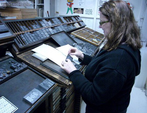Julie Weirenga helping with typsetting