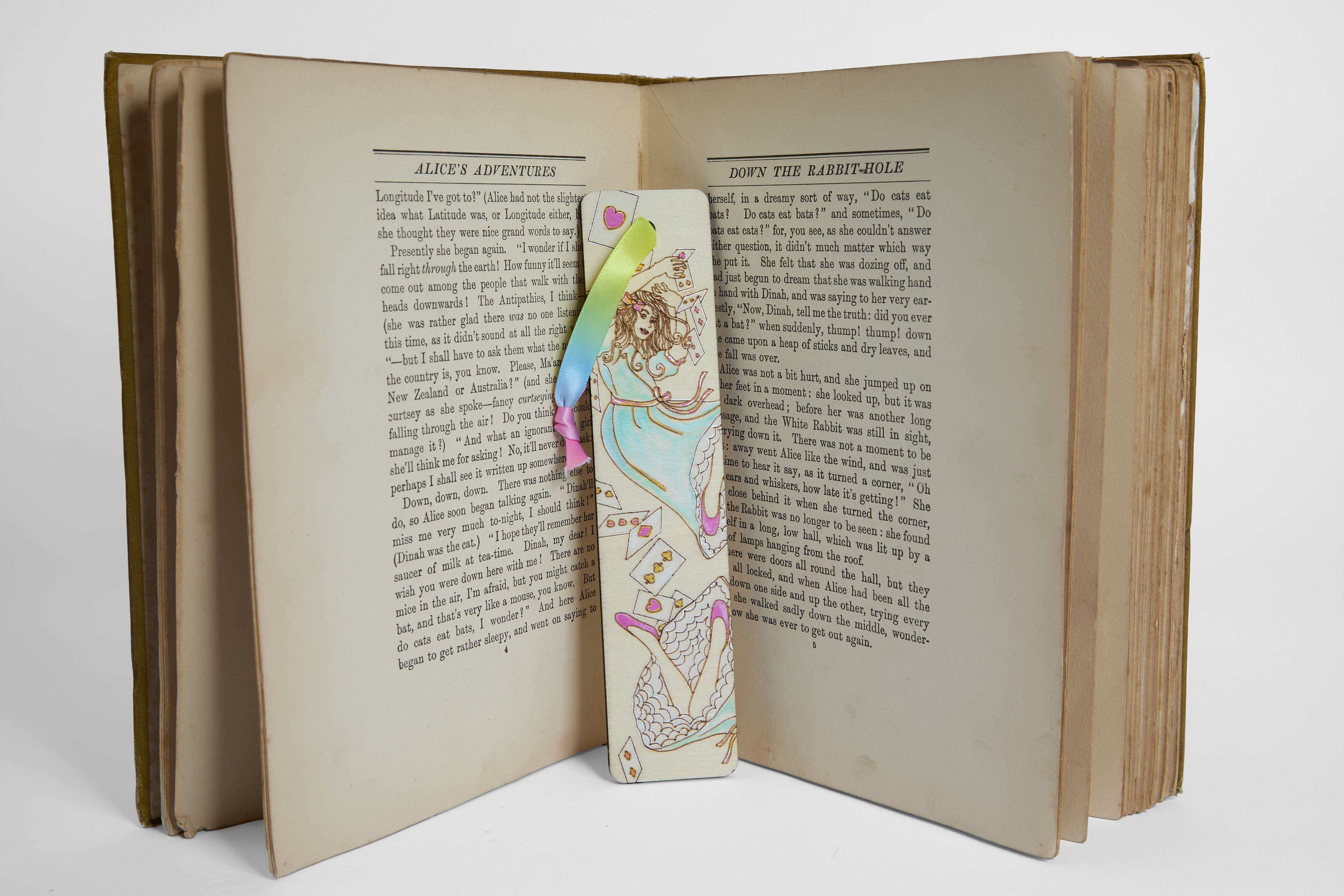 'Alice falling down the rabbit hole' bookmark, laser cut wood and acrylic