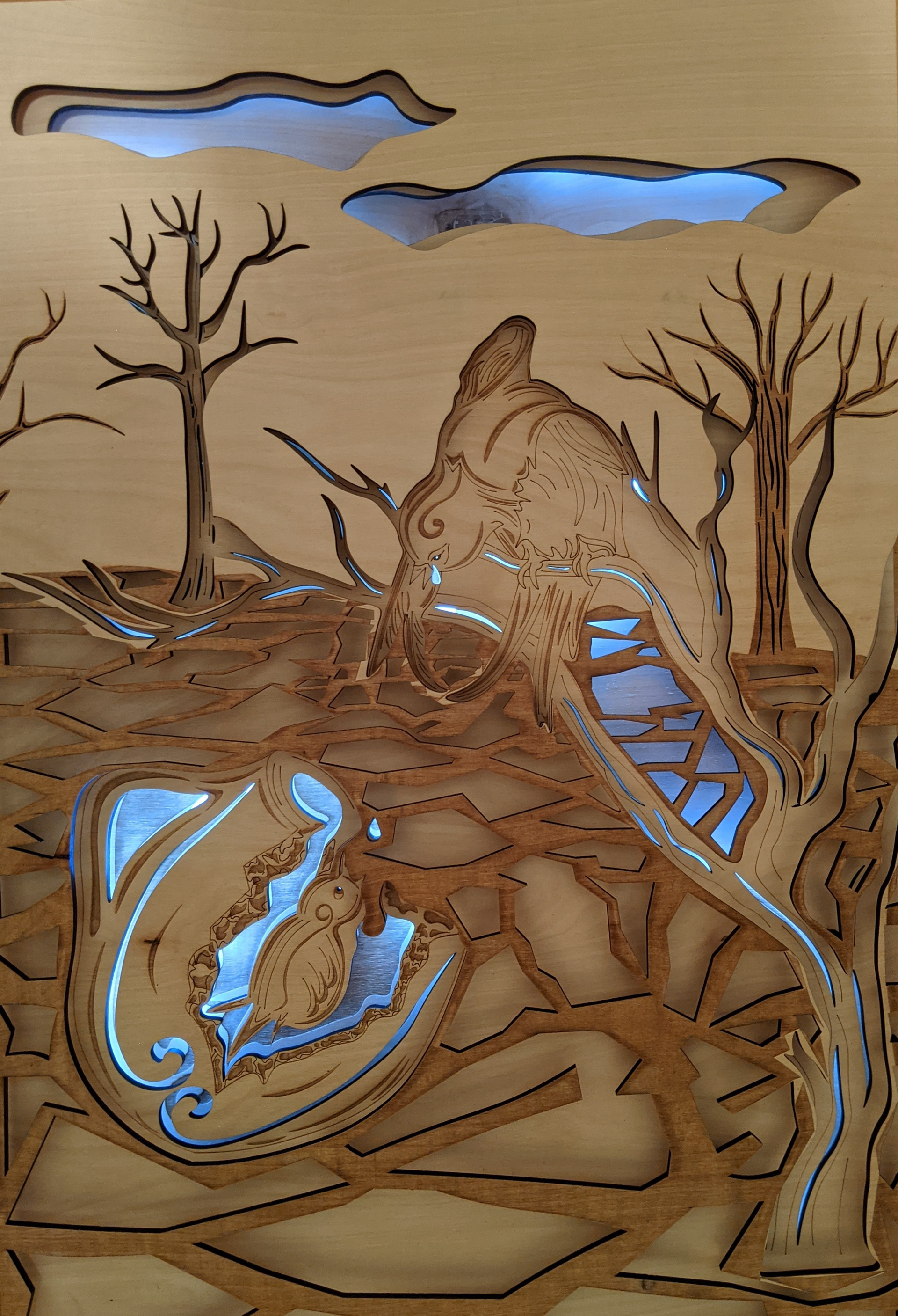Fairy Tales vs. Global Issues: Mother's Tear vs. Global Warming, laser cut birch wood