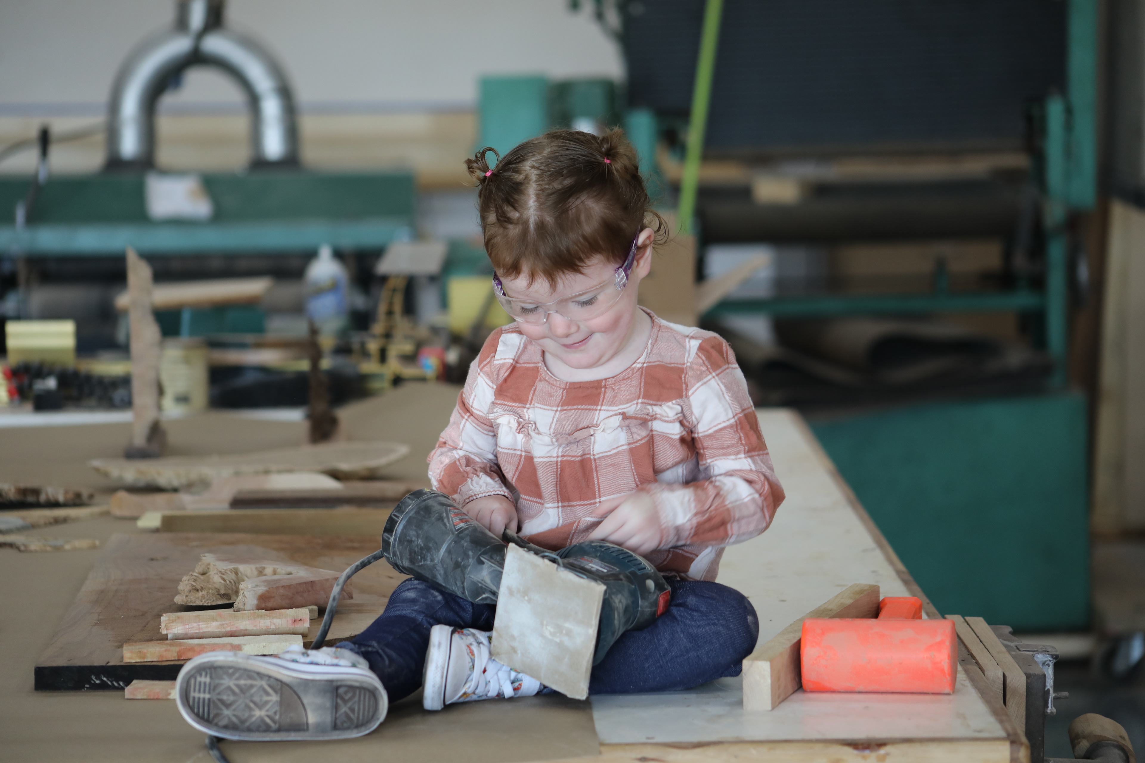 Hazel Estrapala holds tools on Friday, Oct. 21, 20222 at Sawdust Studios in Columbia. Sawdust Studios provides class for those wanting to join the local woodworker community, and memberships for woodworkers who want to utilize the 24/7 studio as they please.