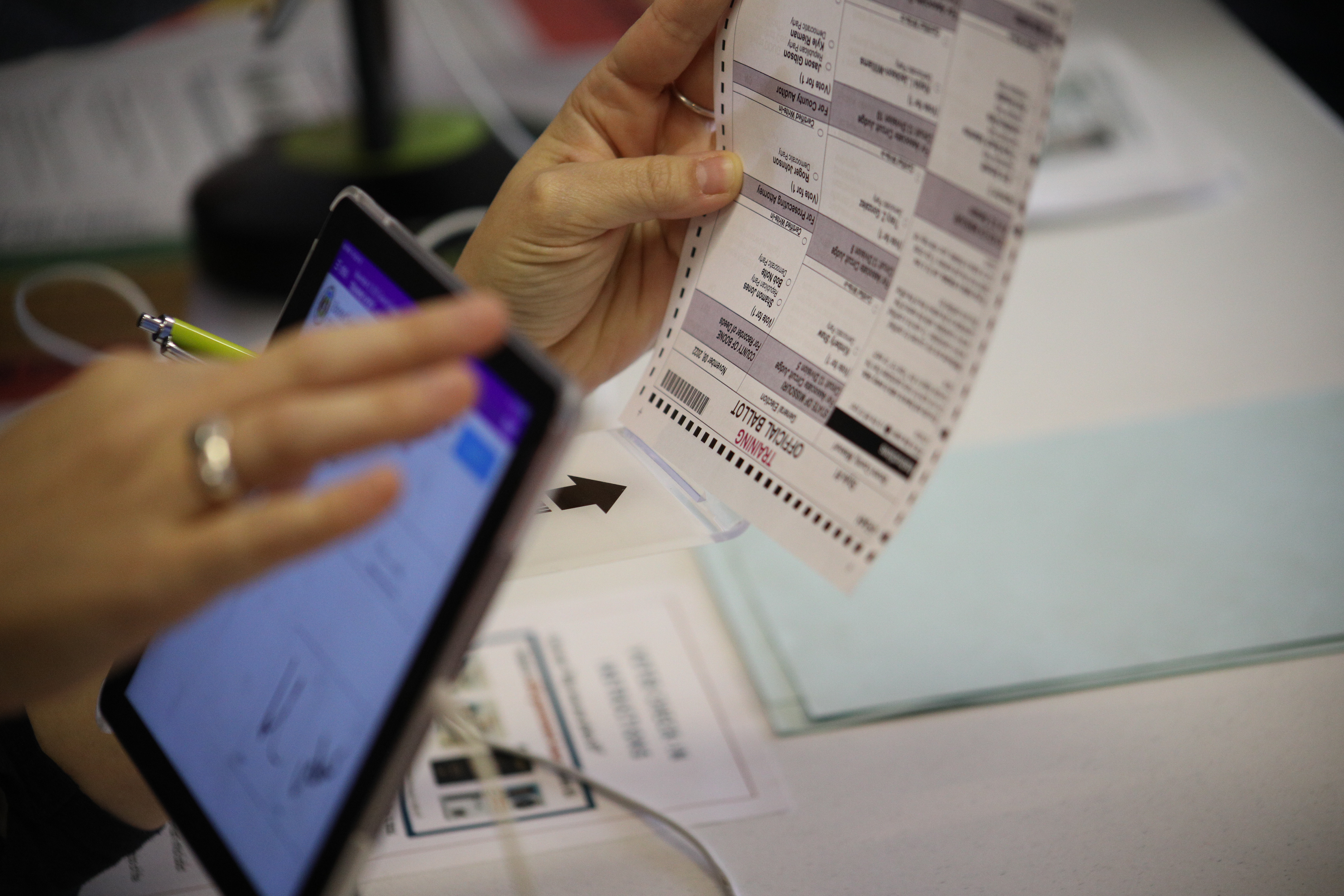 New poll workers practice Election Day protocols on Friday, Oct. 14, 2022 at Boone County Polling Center in Columbia. Poll workers have begun preparing for the election by holding classes and training for new poll workers.
