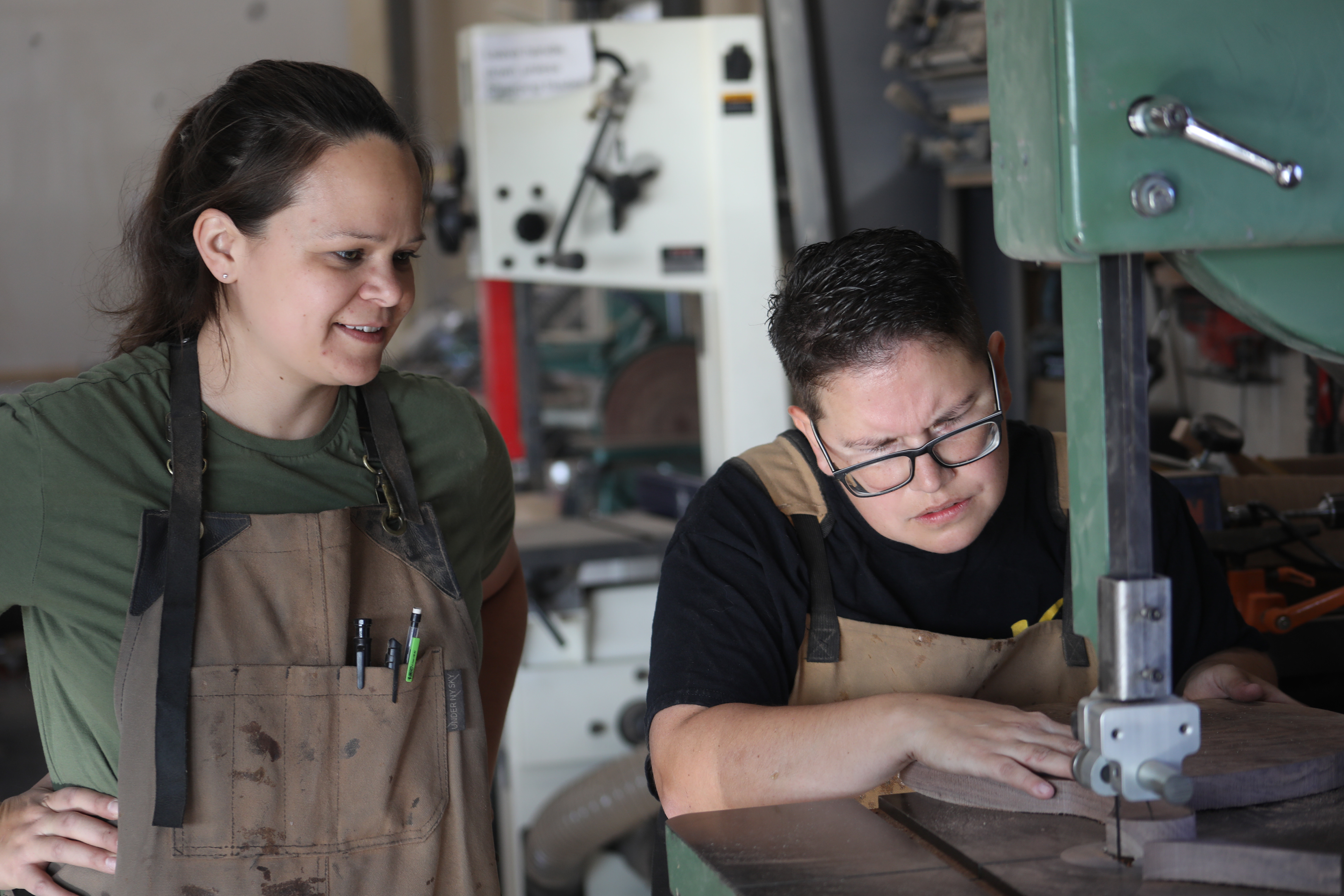 Marika Estrapala craves out a wooden board on Friday, Oct. 21, 20222 at Sawdust Studios in Columbia. Sara and Marika created their own last name, by combining their last names, Estrada and Pipala.