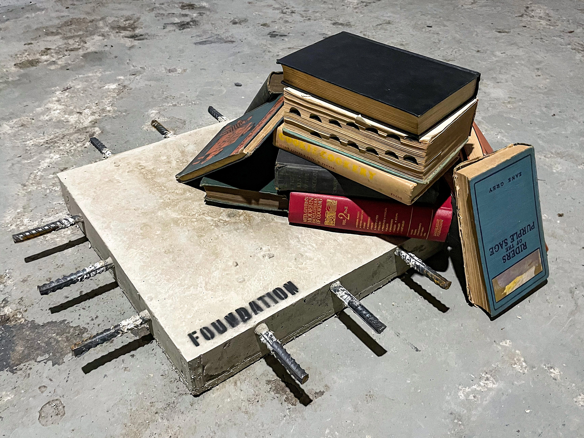 Sculpture, material: concrete, books
