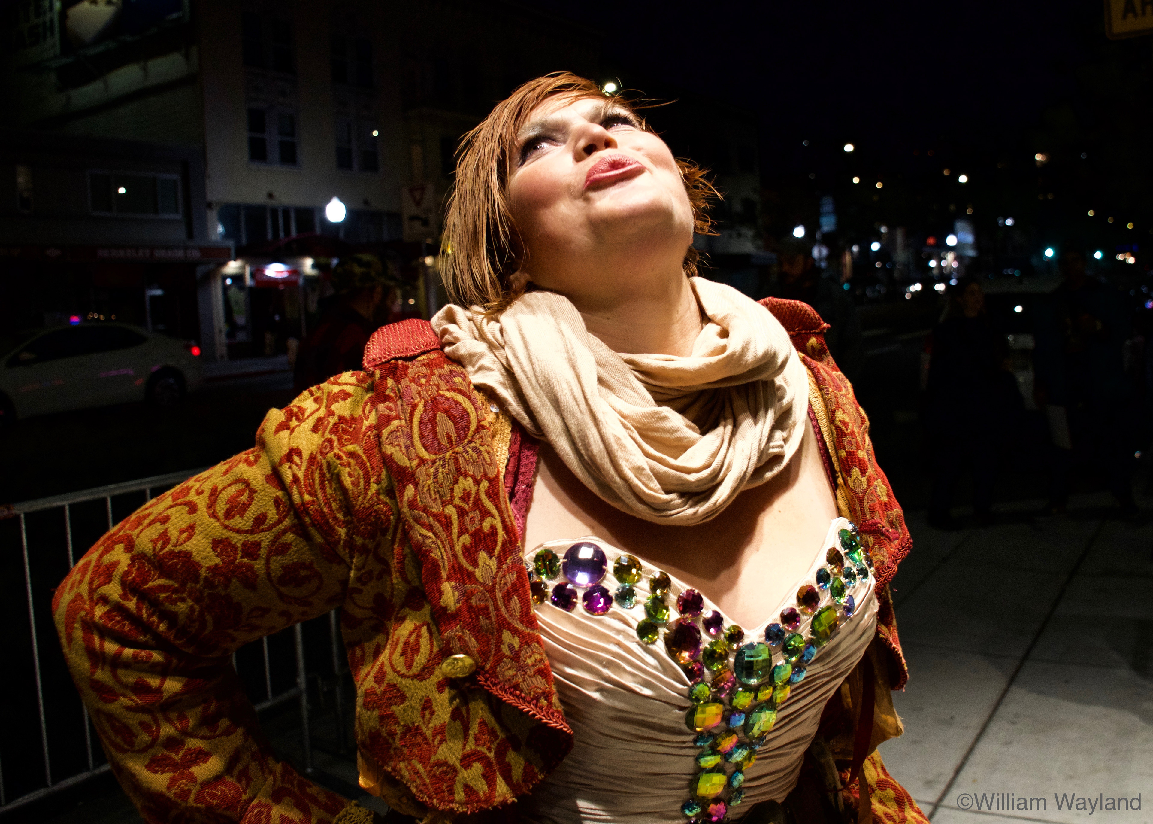 Color street photo of red-haired woman