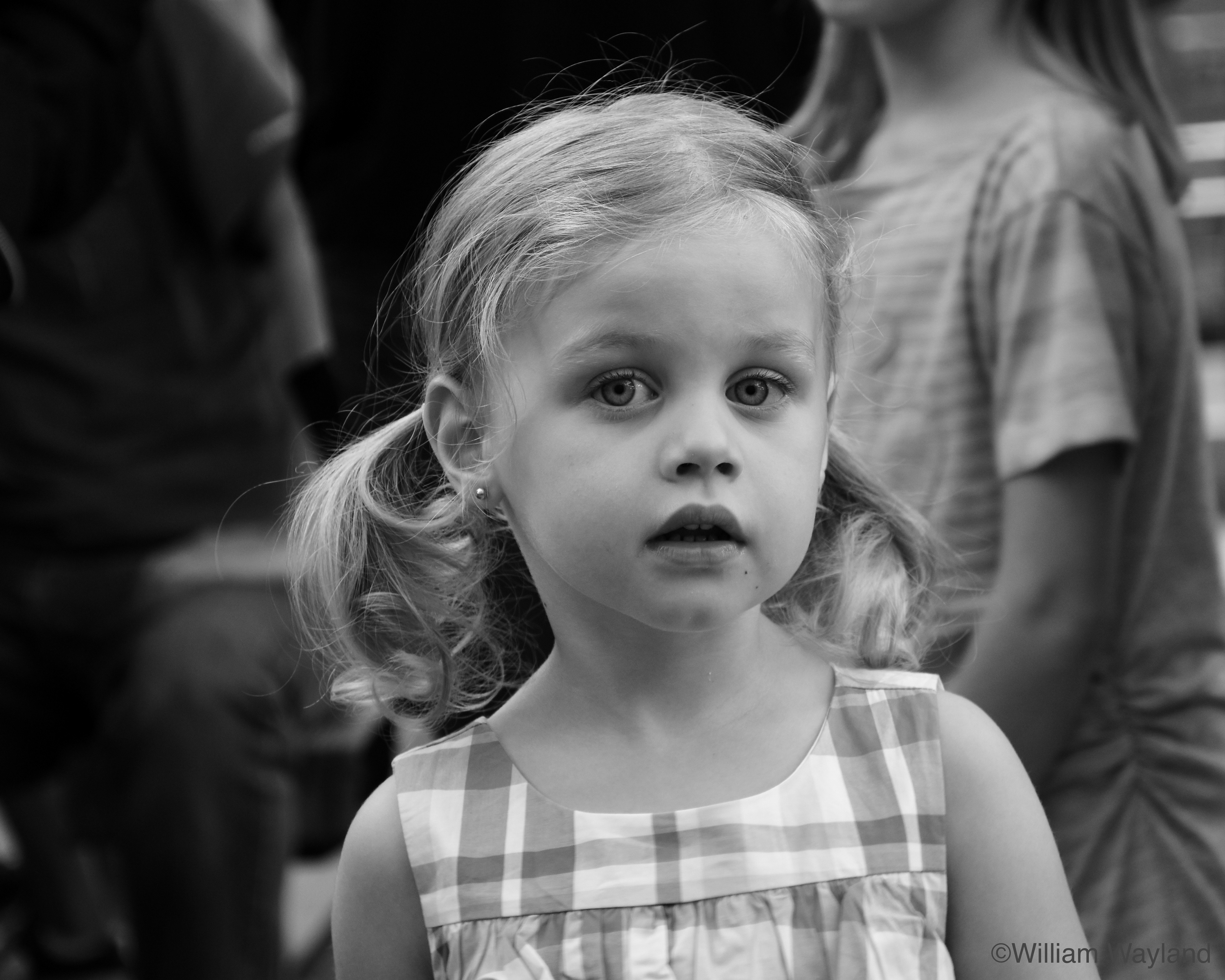Black and white street photography of girl by William Wayland