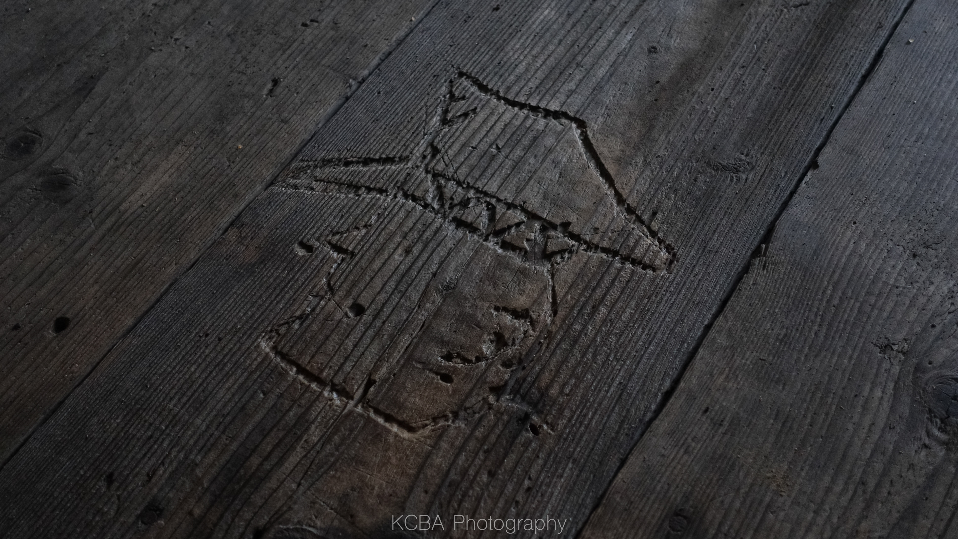 Oswiecim, Poland / Birkenau Concentration Camp. A mark left by a victim on the wooden bed base, Birkenau Concentration Camp.