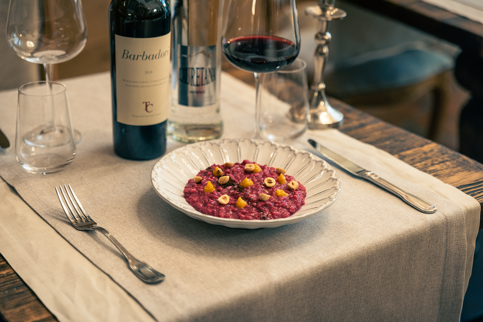 Risotto riserva San Massimo, rapa rossa, arancia, caffè e nocciola