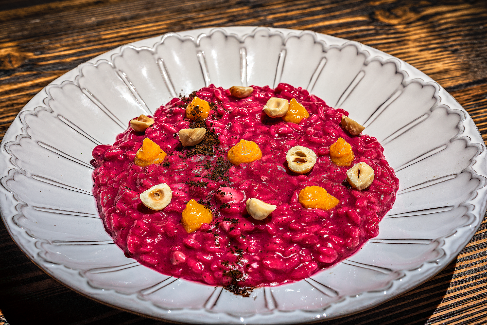 Risotto riserva San Massimo, rapa rossa, arancia, caffè e nocciola
