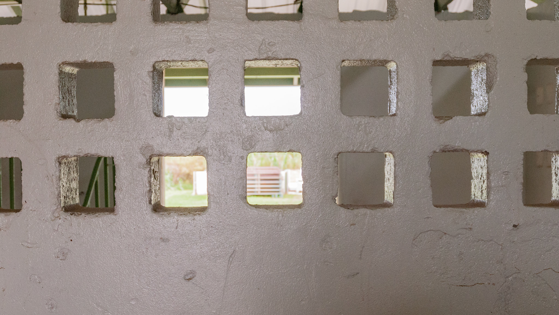 Holes in a cinder block wall for ventilation