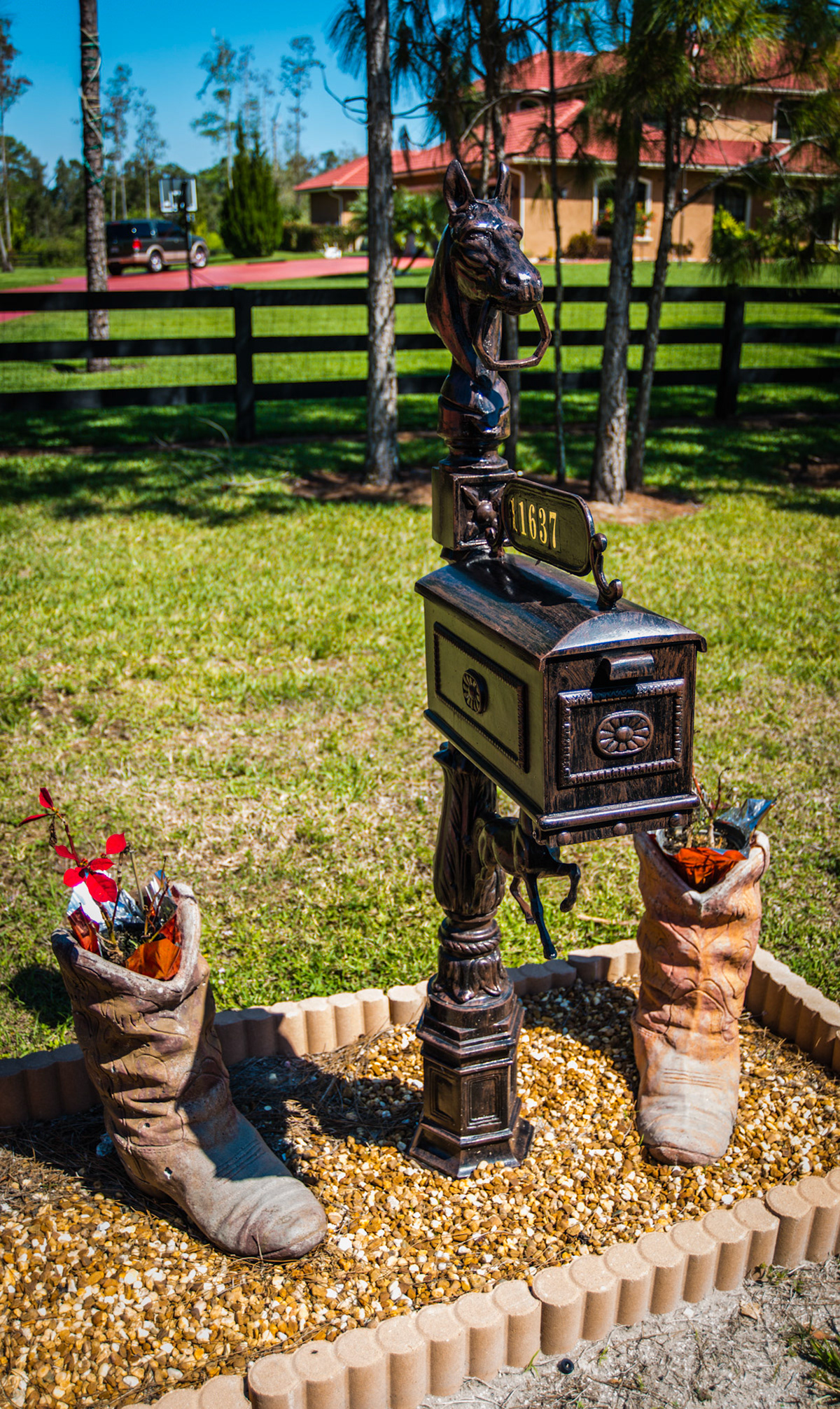 Boot flower pots around a mail box
