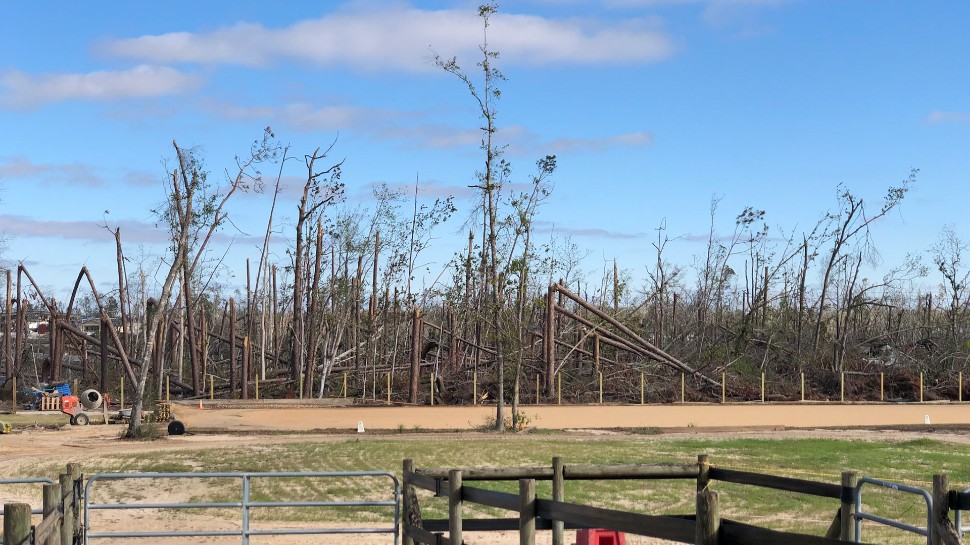 AFTER: This barn in Panama City, FL was hit by a severe hurricane.  See the trees in the before pictures and the wasteland missing trees and wide open spaces which were once wooded lands.  Amazingly, the barn was untouched.