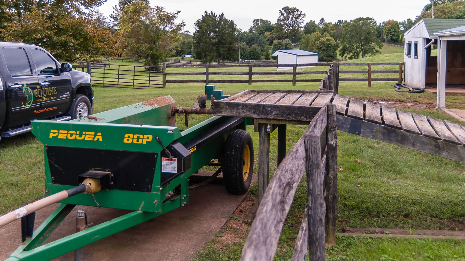 A simple ramp with a steep grade, no guard rails, poor traction and a short platform. However the spreader can be placed underneath the platform to reduce spillage.