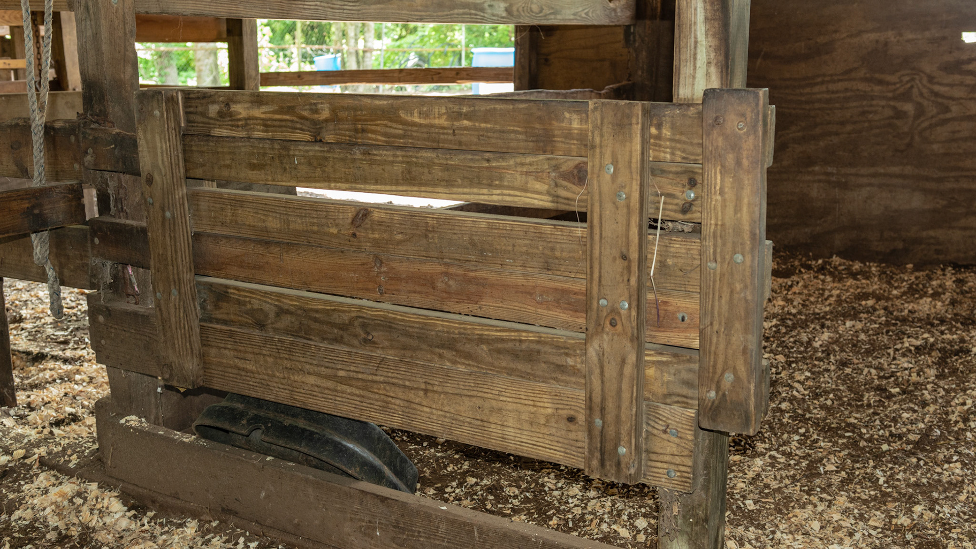 A sliding stall gate hand made from 2x4 lumber.
