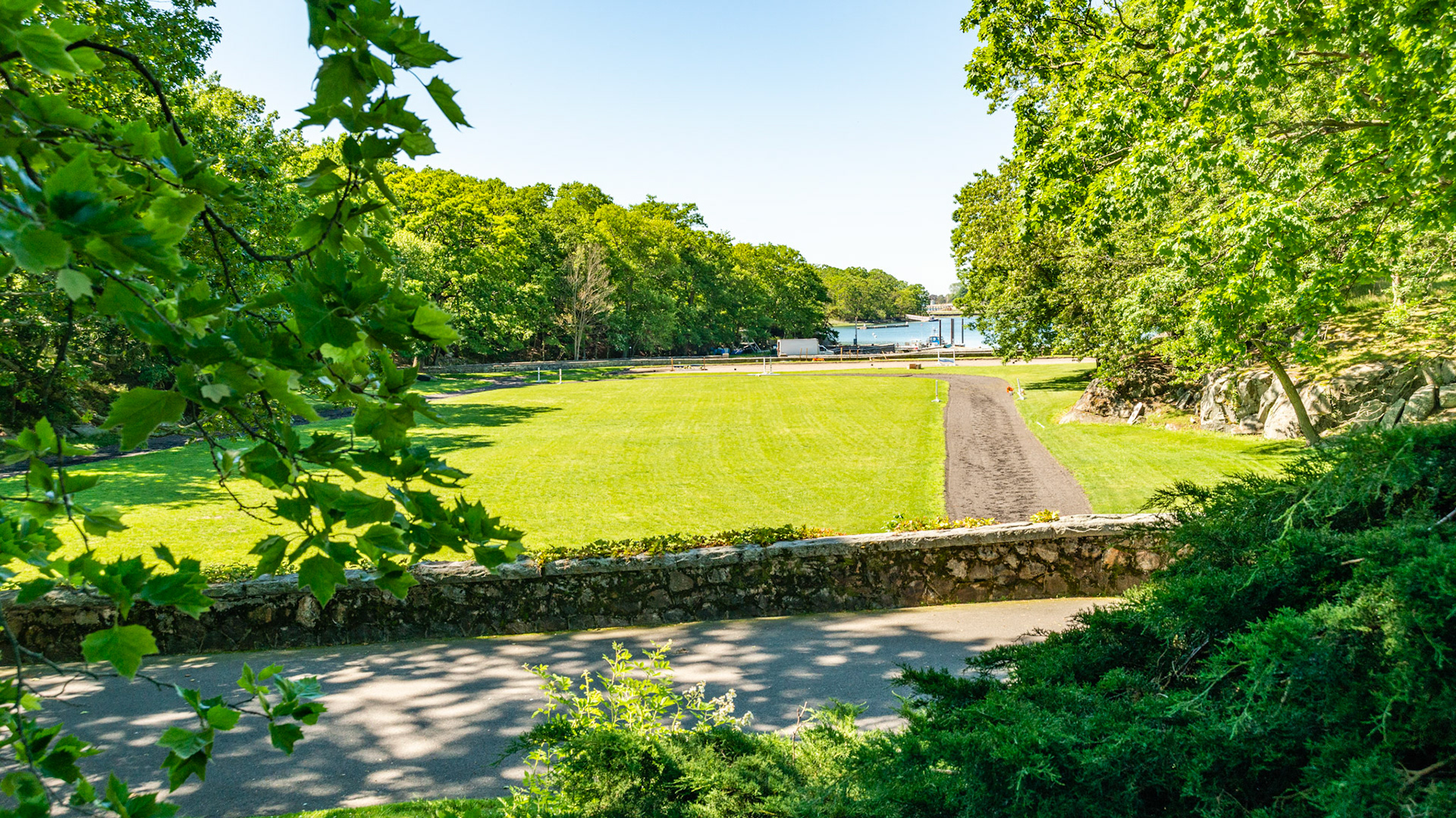 This is the outdoor riding ring with the inlet to Long Island Sound in the distance. A famous barn in CT that was built in the 1940's by the same archetect used in the building of Grand Central Station in NYC.