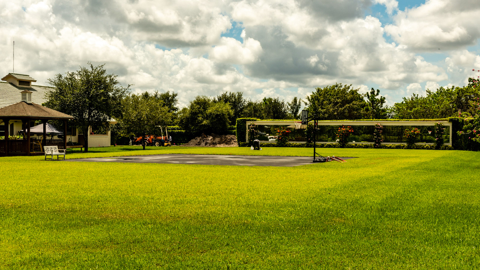 When you buy a farm with an arena and you don't want it but do want a place to play basketball with your son, this is an option. When it's time to resell the farm, the blacktop and sod will be removed to reveal a full dressage arena.