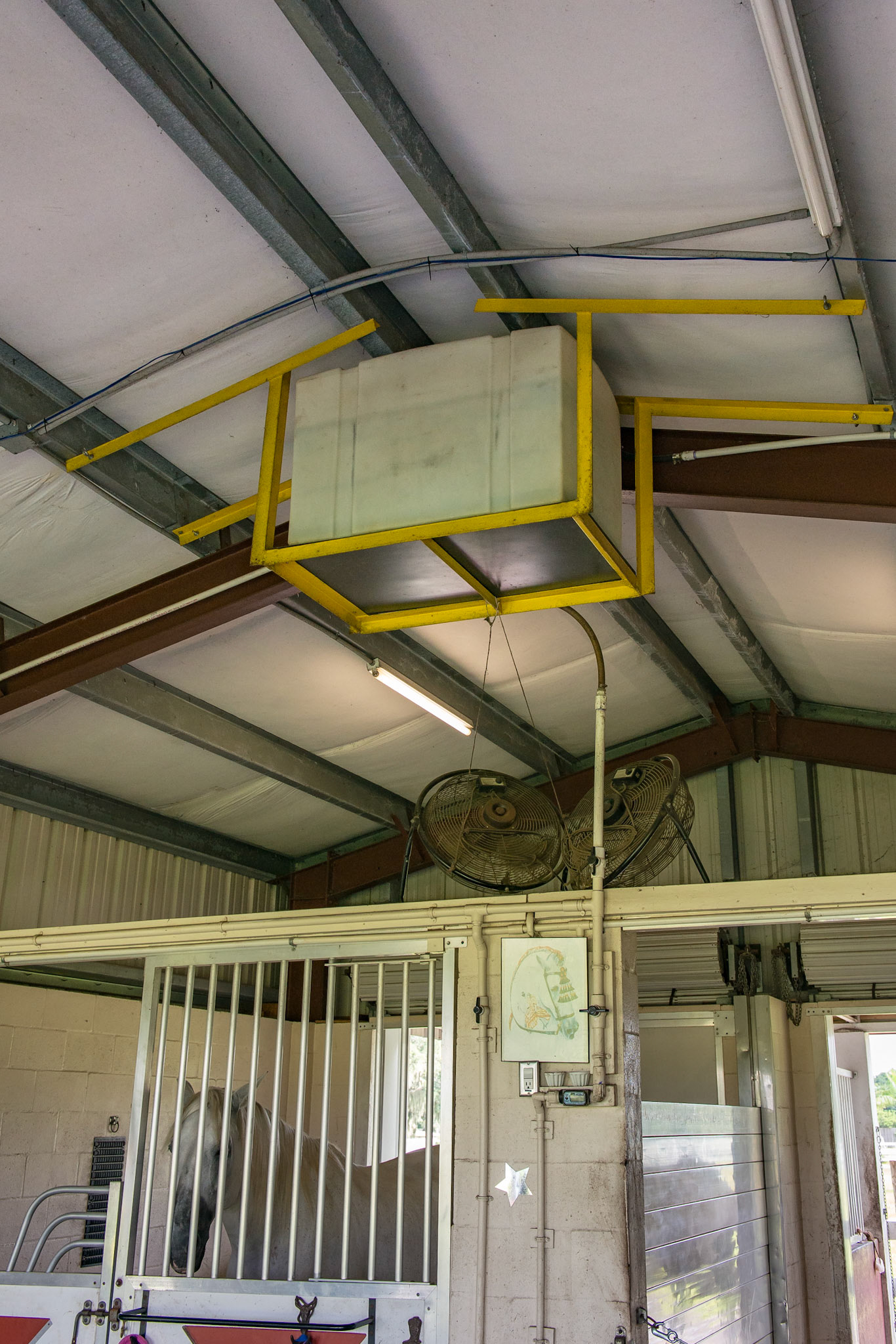 Water is pumped into this reservoir giving a 3 day supply of water for 2 horses. It is gravity fed which allows water flow without electricity. It also airs out the sulfur smell before being delivered to the horses.