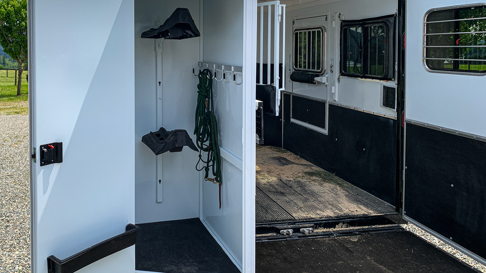 Tack and equipment are stored in this isolated part og the swing out rear door.