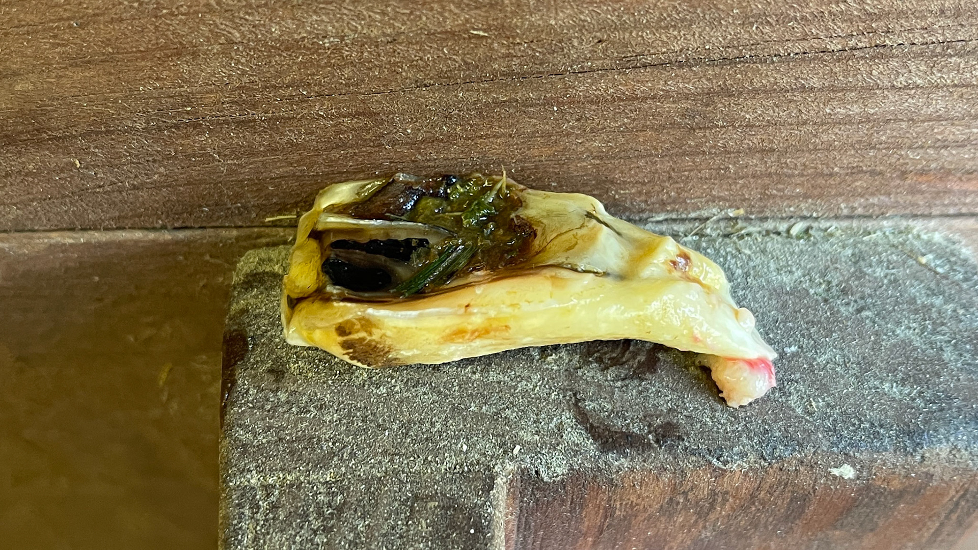 109 palatal sagittal fracture piece extracted from this pony without medication. Note the curved end where it had been pushed away for a long time. Also, there was a mirror fracture at 209 that had passed some time ago. 12 year old pony.