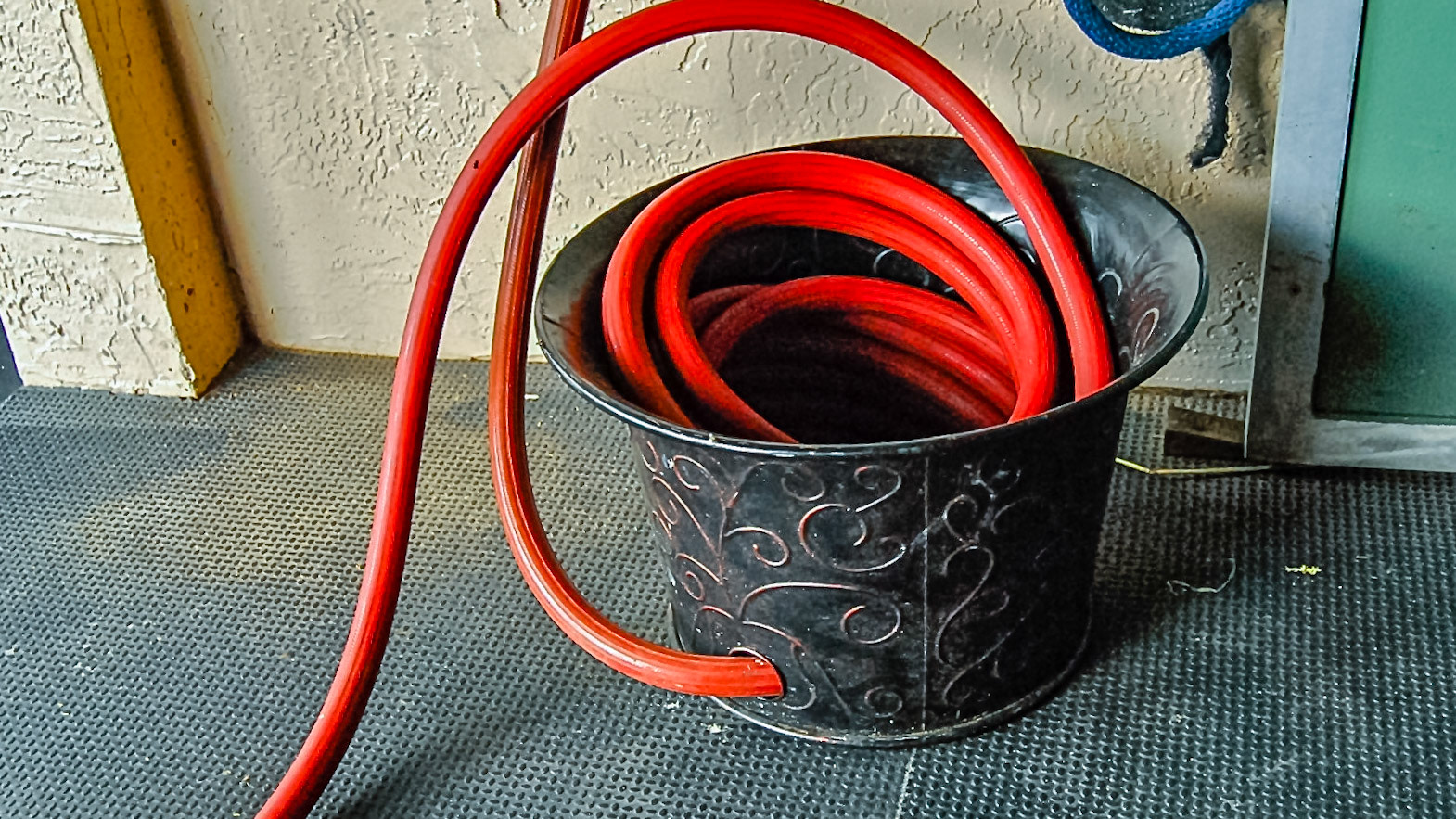 Decorative hose container