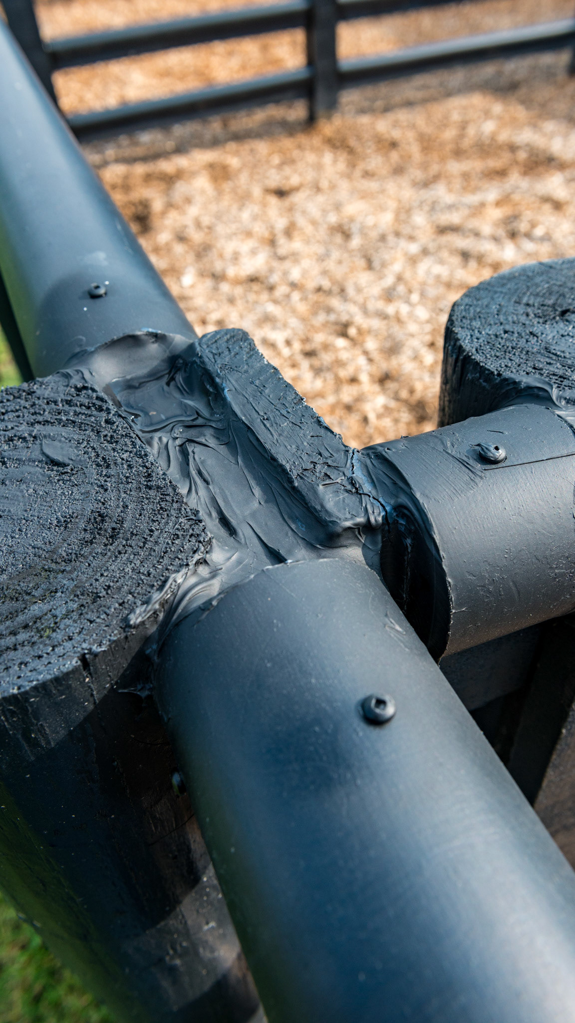 PVC pipe is cut and attached with screws to the top board to prevent wood chewing. The ends are sealed. The owner says this system works very well.