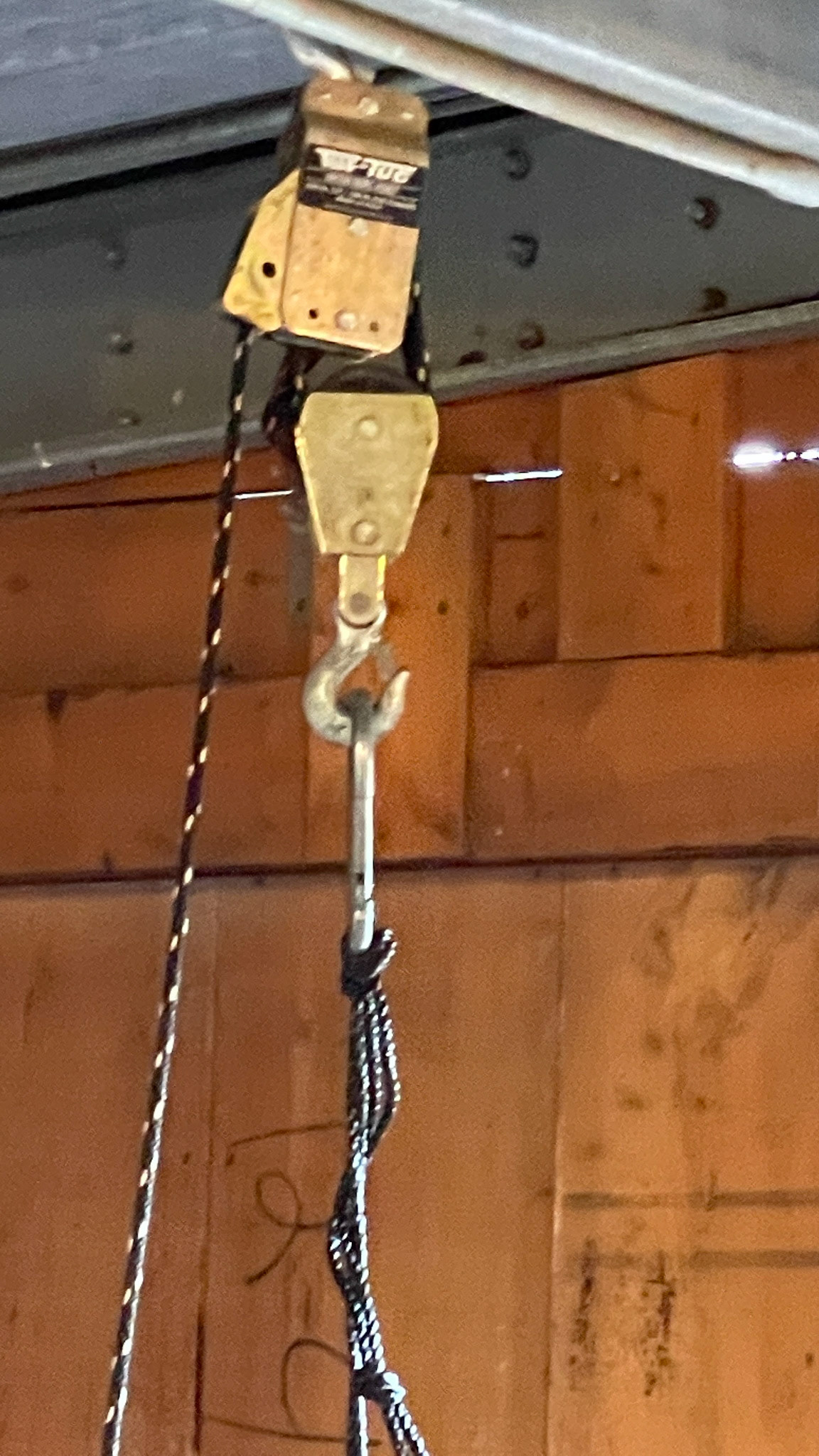 A rope winch system for raising and draining soaked hay.