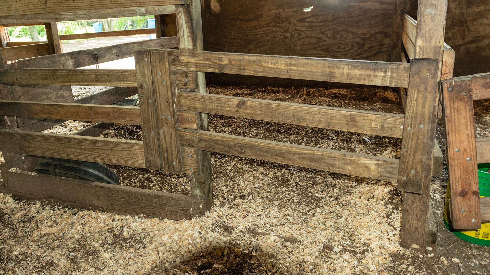 A sliding stall gate hand made from 2x4 lumber.
